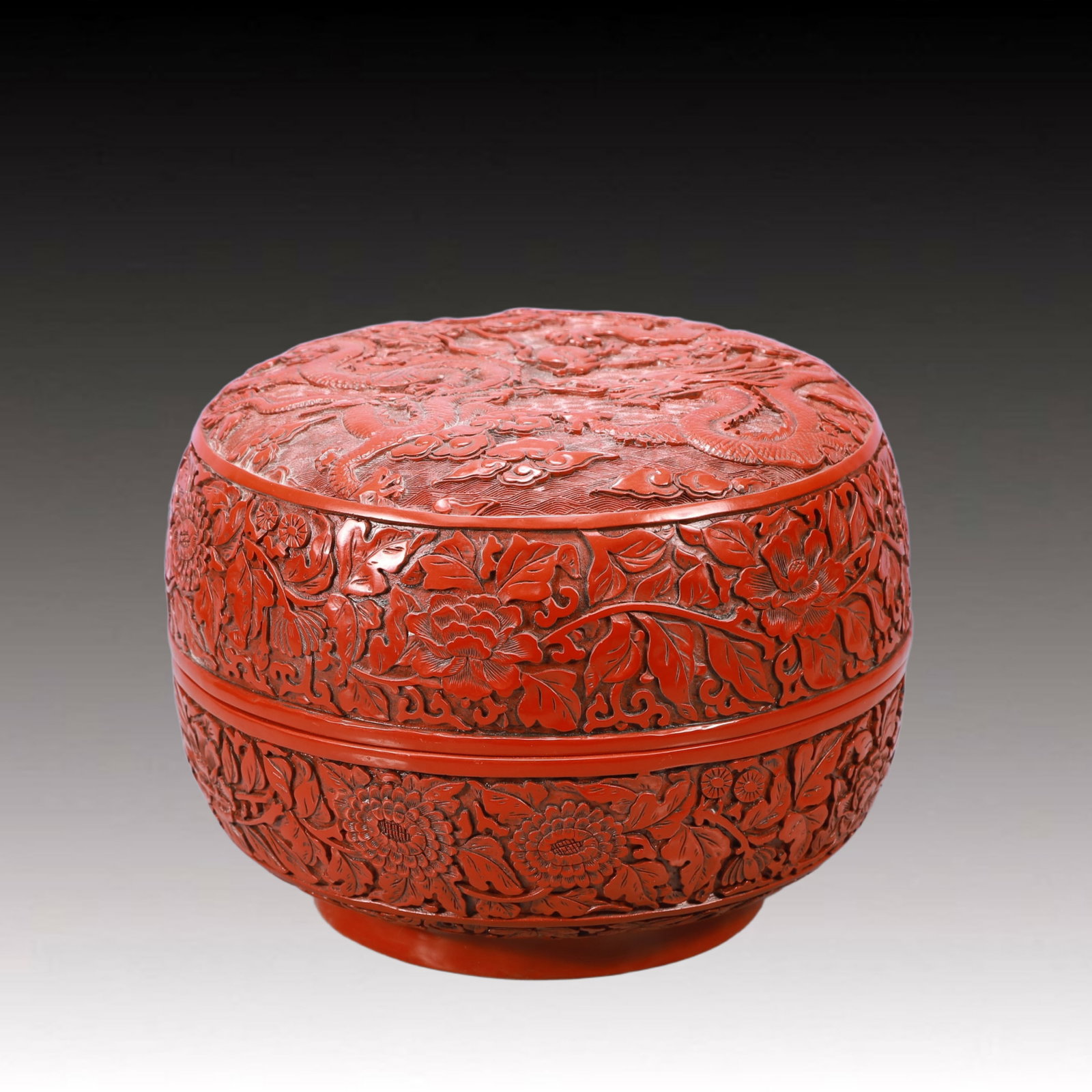 An Exquisite Carved Red Lacquer Auspicious Cloud and Dragon Pattern Box: An Exquisite Carved Red Lacquer Auspicious Cloud and Dragon Pattern Box,Qing Dynasty, China, Qianlong Six-character Mark,Size:10.2inx7.9inWeight:2850g 剔红漆祥云龙&