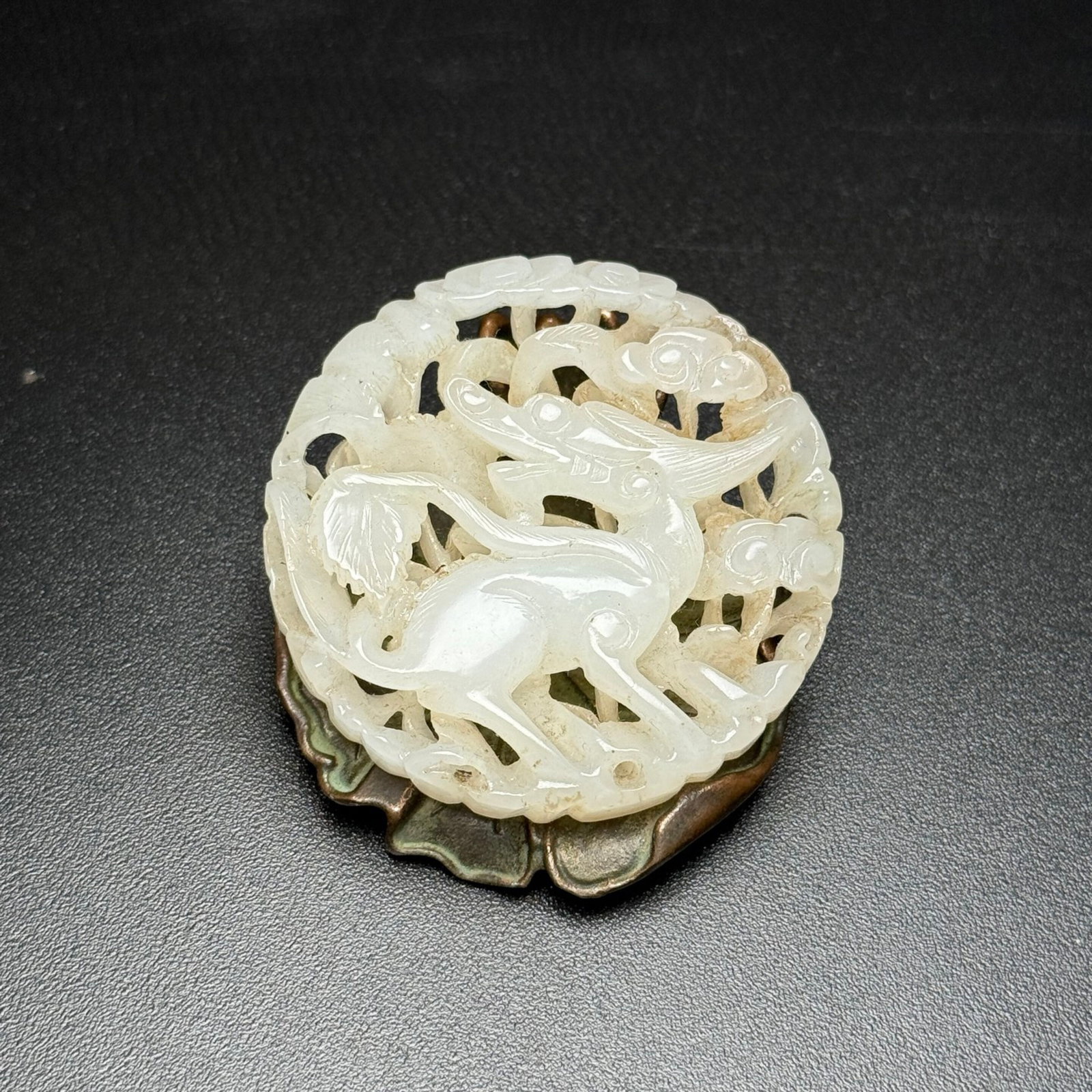 An Exquisite White Jade Hollow Kylin Pattern Pendant: An Exquisite White Jade Hollow Kylin Pattern Pendant,Qing Dynasty,China,Size:2inx0.4in,Weight:34g 白玉镂空麒麟纹挂件,中国清É