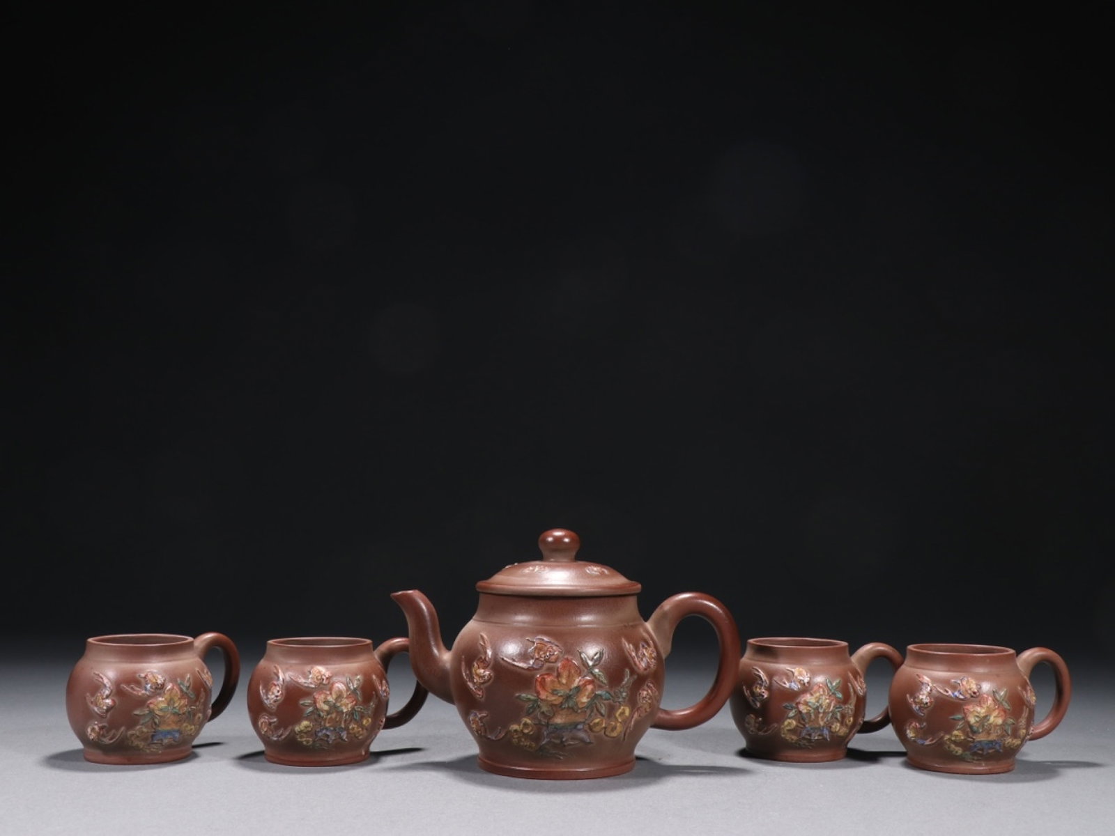 A Set of Rare Purple Sands Painted Color Bats and Peach Pattern Teaware,with poems: A Set of Rare Purple Sands Painted Color Bats and Peach Pattern Teaware,with poems,Qing Dynasty,China,Ge Zihou Mark,Size:(Teapot)4.1inx5.9in,(Cup)2inx3.2in 一套紫砂彩 