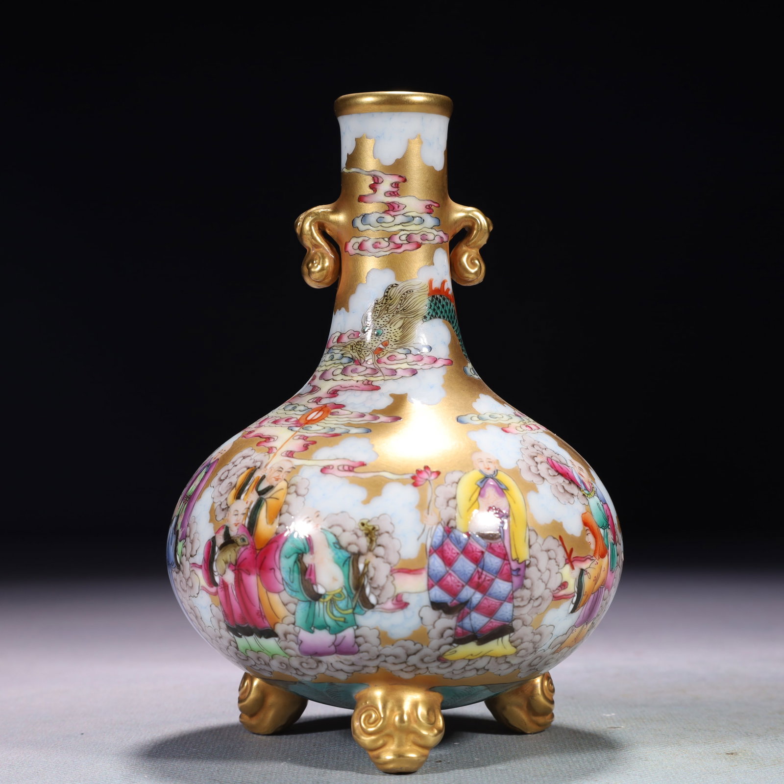 An Exquisite Famille-Rose Painted Gold Character and Story Pattern Double-Ears and Tripod Vase: An Exquisite Famille-Rose Painted Gold Character and Story Pattern Double-Ears and Tripod Vase,Qing Dynasty,China,Yongzheng Four-character Mark,Size:3.5inx5.9in,Weight:400g 粉彩描