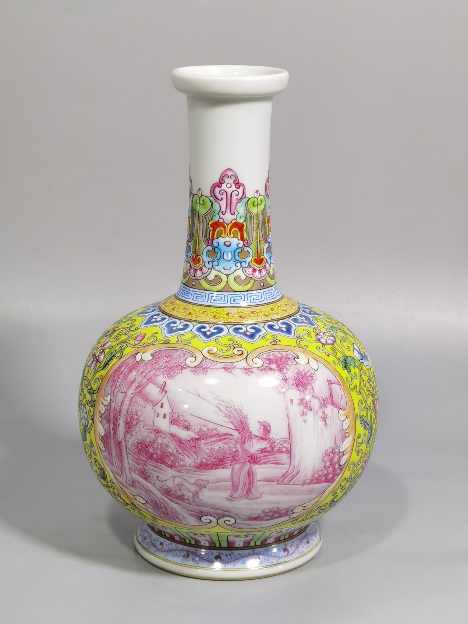 An Exquisite Yellow Ground Ruby Red-Glazed Landscape and Figure Pattern Vase: An Exquisite Yellow Ground Ruby Red-Glazed Landscape and Figure Pattern Vase,Qing Dynasty,China,Qianlong Four-character Mark,Size:7.7inx4.7in 黄地胭脂红山水&#