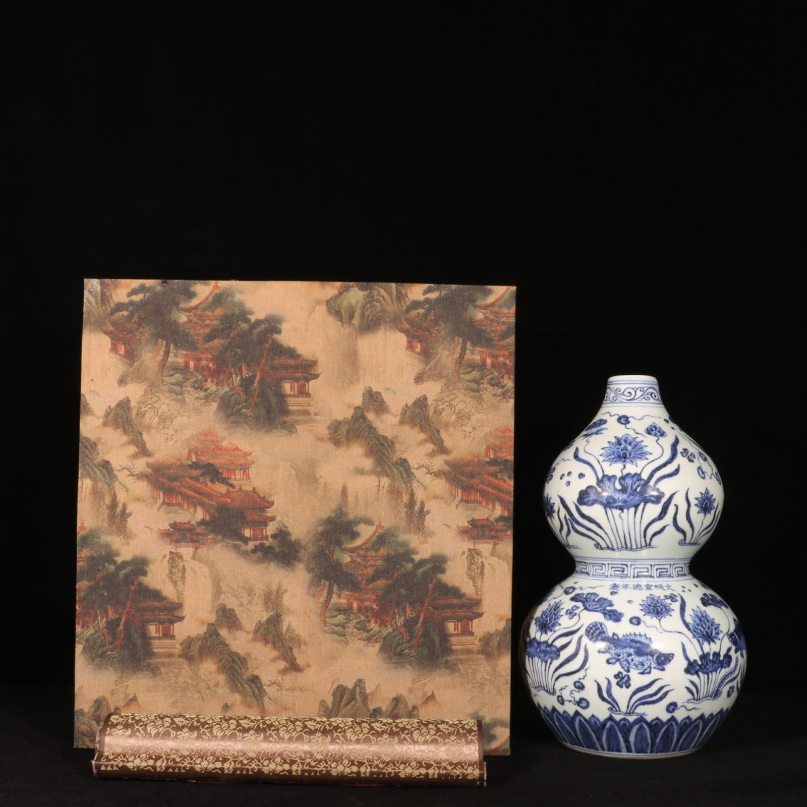 A Rare Blue and White Hornwort Pattern Gourd-Shaped Vase,with Chinese Vertical Scroll Ink Painting: A Rare Blue and White Hornwort Pattern Gourd-Shaped Vase,with Chinese Vertical Scroll Ink Painting on Silk,Ming Dynasty,China,Xuande Six-character Mark,Size:13inx7.1in 青花鱼藻