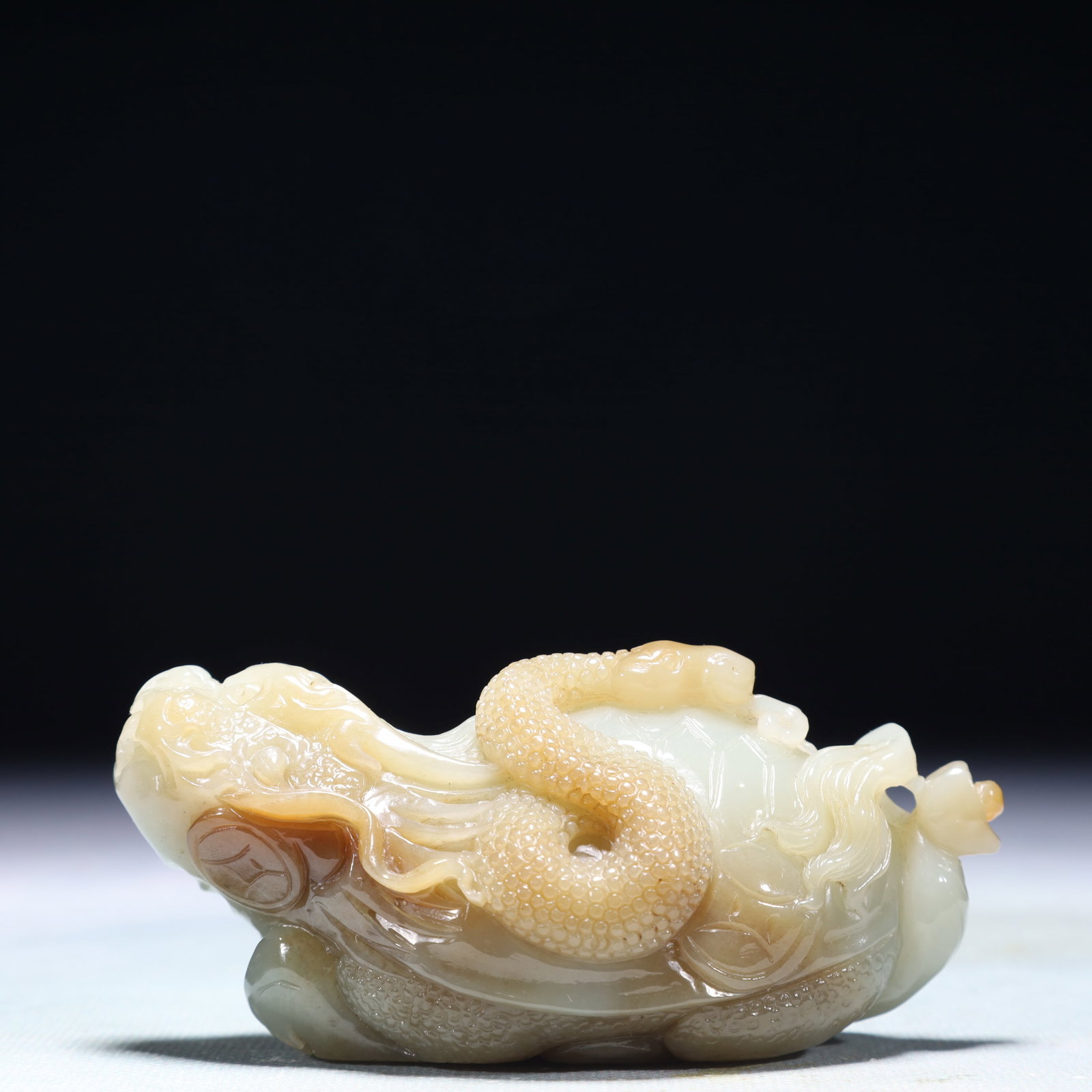 An Exquisite White Jade Auspicious Beast Ornament: An Exquisite White Jade Auspicious Beast Ornament,Qing Dynasty,China,Size:4.1inx1.8inx1.6in,Weight:273.6g 白玉瑞兽摆件,中国清代