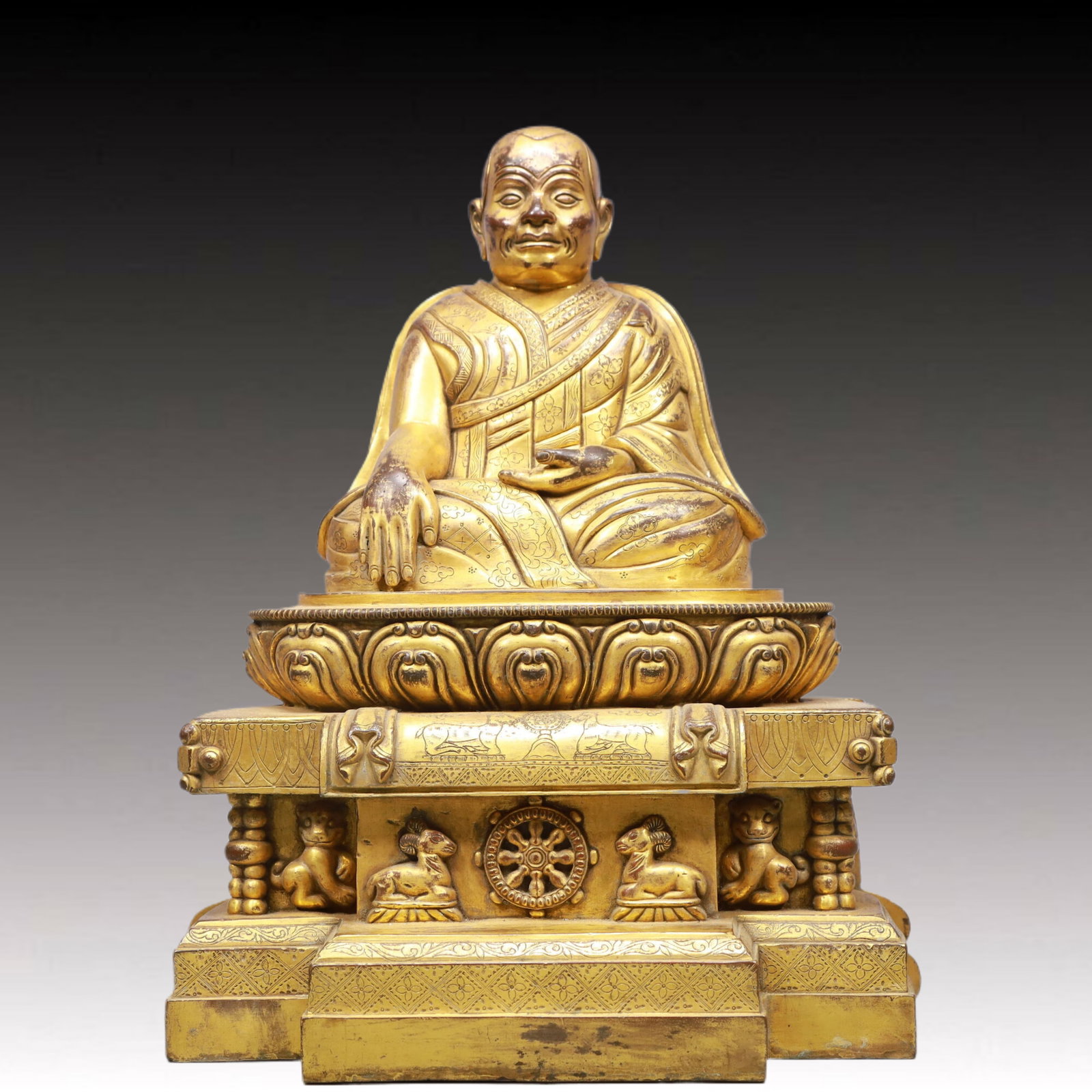 A Solemn Gilt Bronze Statue of Guru: A Solemn Gilt Bronze Statue of Guru,Ming Dynasty, China,Size:29x20x14.2in,Weight:10150g 铜鎏金上师像,中国明代,尺寸:29x20x14.2in,