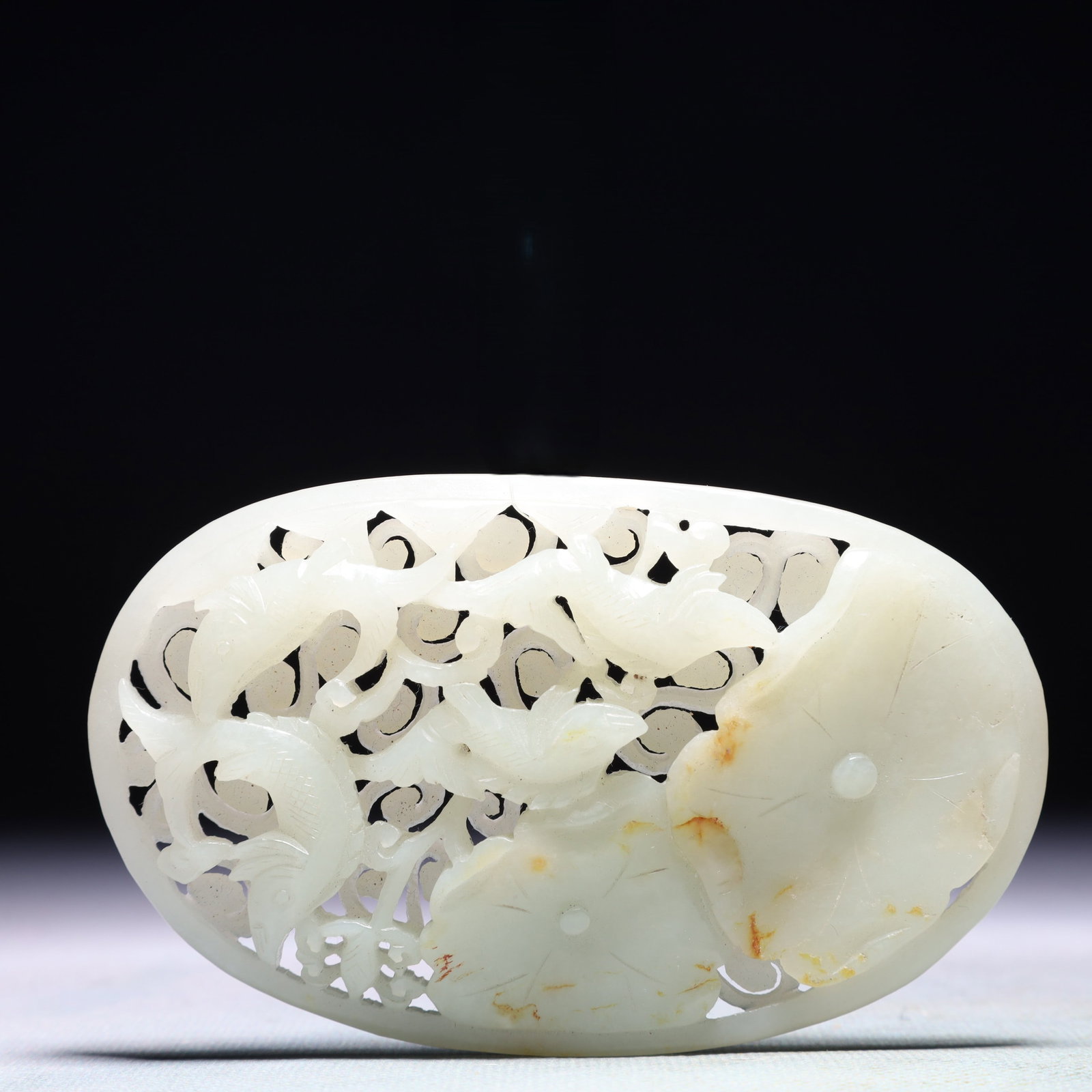 An Exquisite White Jade Flower Pattern Pendant: An Exquisite White Jade Flower Pattern Pendant,Qing Dynasty,China,Size:4.3inx2.6in,Weight:108.8g 白玉花卉纹佩,中国清代