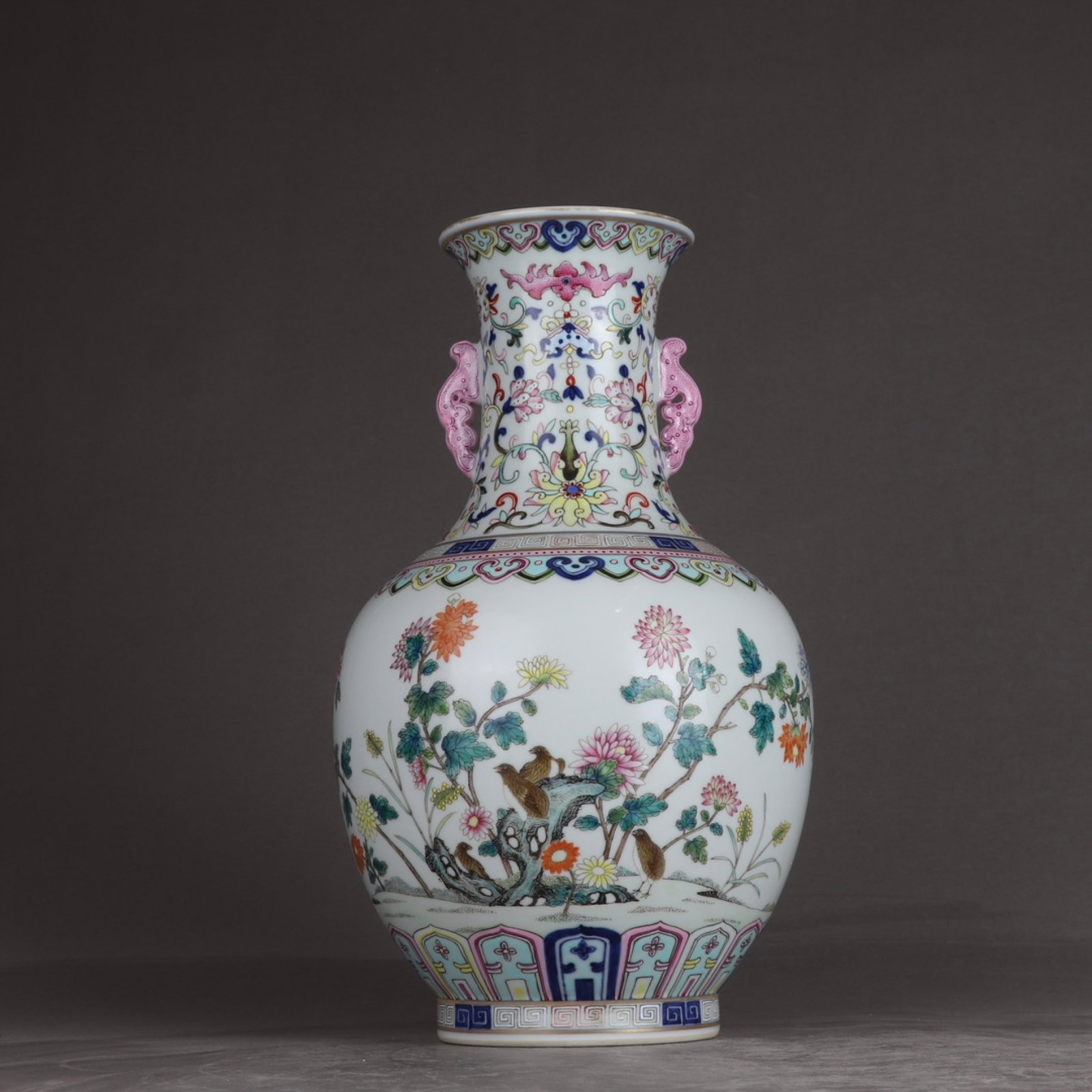 A Rare Famille-Rose Flower and Bird Pattern Double-Ears Vase: A Rare Famille-Rose Flower and Bird Pattern Double-Ears Vase,Qing Dynasty,China,Qianlong Six-character Mark,Size:13inx7.3in 粉彩花鸟纹双耳瓶,中