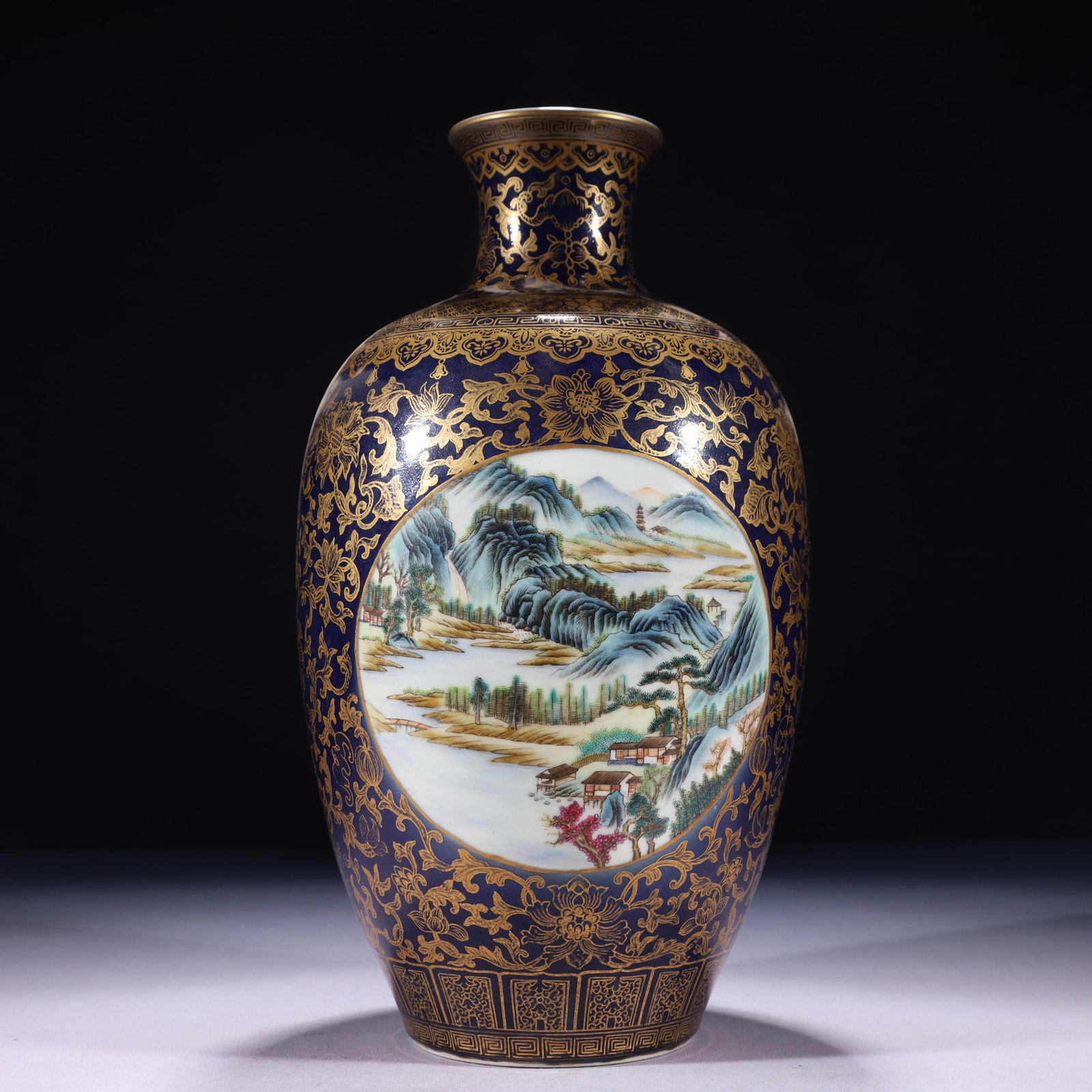 An Exquisite Ji Blue Glazed Enamel Painted Gold Landscape Pattern Vase (1 of 12)