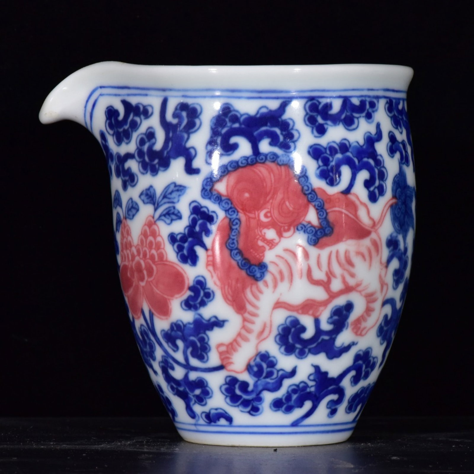 An Exquisite Blue and White Underglaze-Red Lion Pattern Cup (1 of 9)