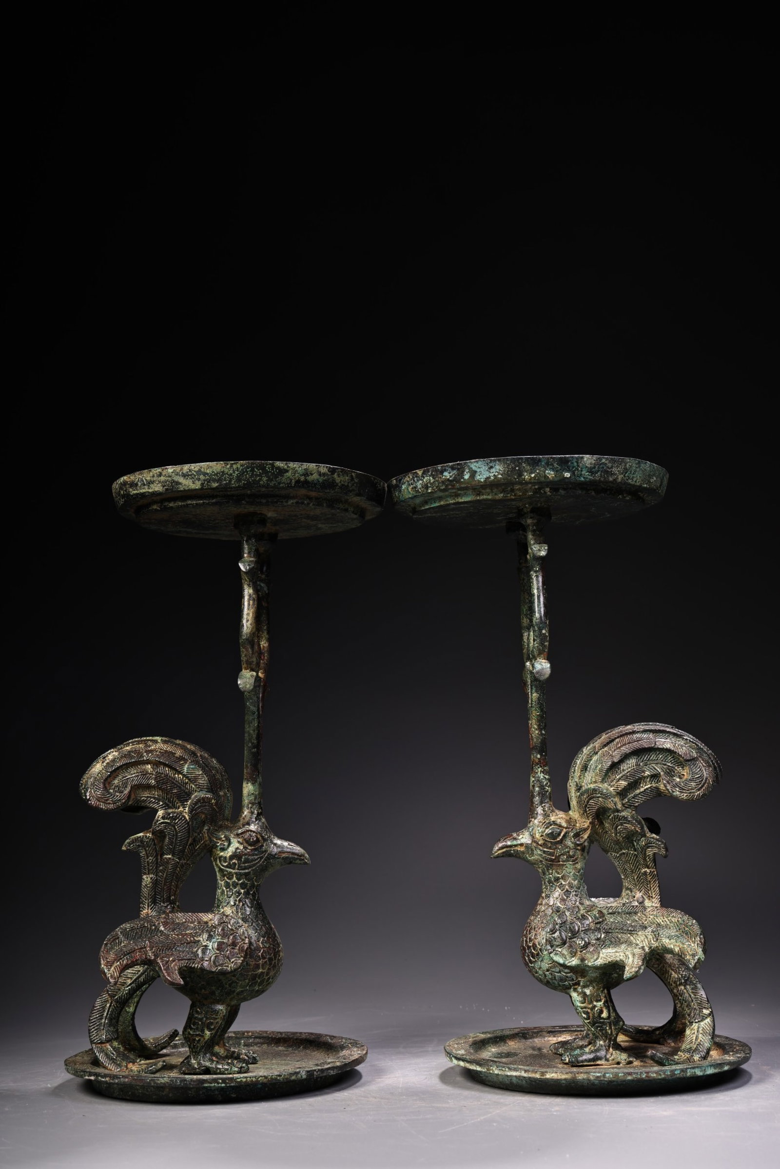 A Pair of Exquisite Bronze Bird Candlesticks: A Pair of Exquisite Bronze Bird Candlesticks,the Warring States period in China,Size:11.8inx5.9in,Weight:2500g 一对青铜鸟烛台,中国战国