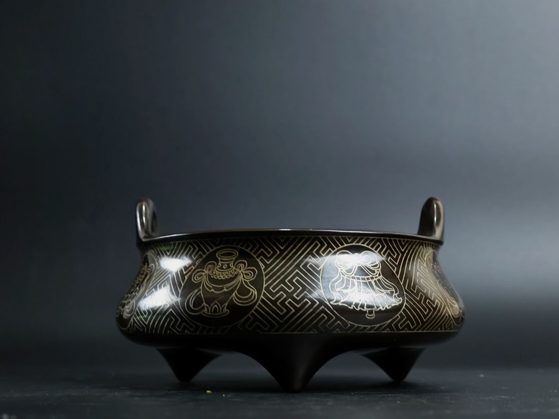 An Exquisite Bronze Inlaid Silver Eight Treasures Pattern Double-Ears and Tripod Censer: An Exquisite Bronze Inlaid Silver Eight Treasures Pattern Double-Ears and Tripod Censer,Ming Dynasty, China, Xuande Six-character Mark,Size:3.4inx5.4in,Weight:1390g 铜嵌银八