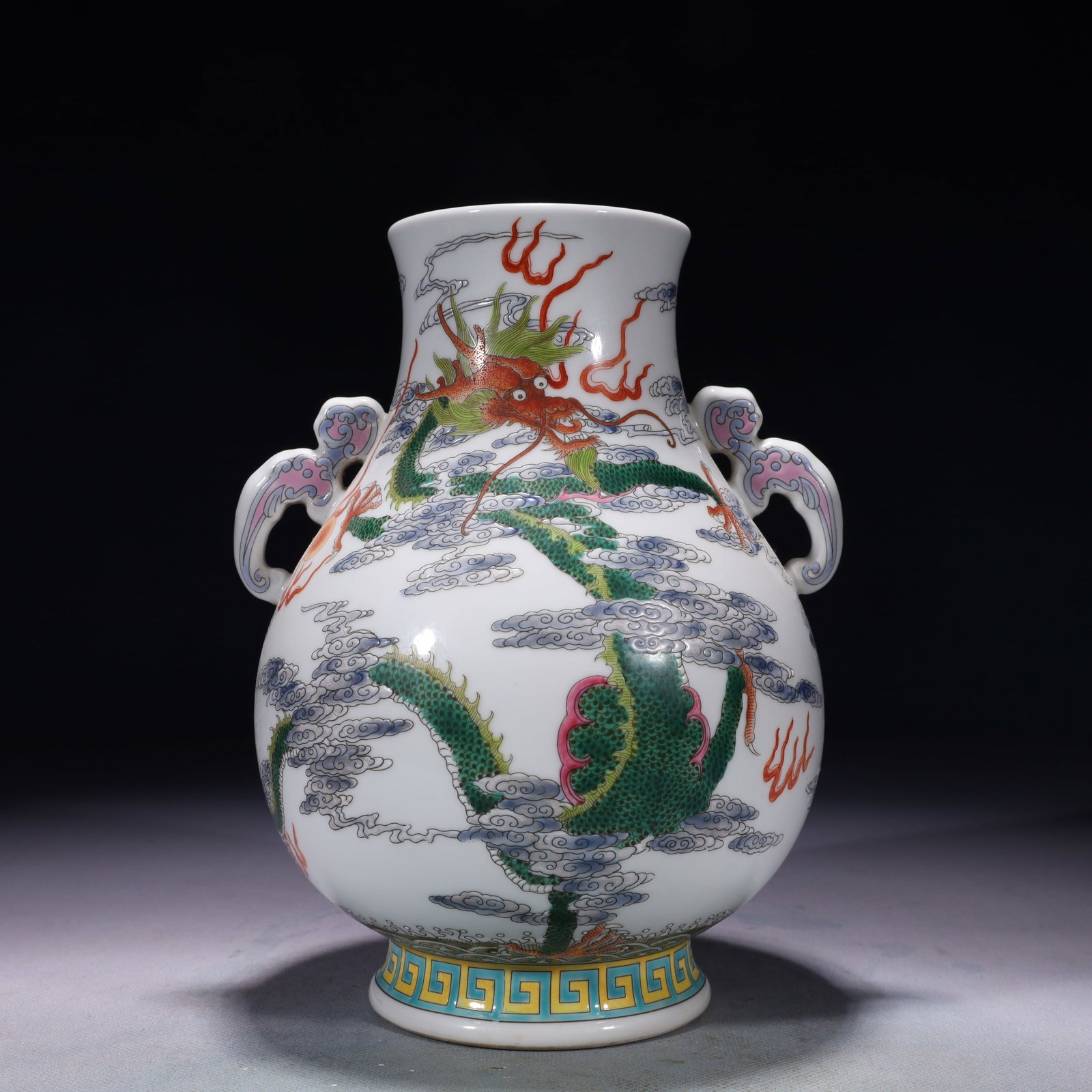 An Exquisite Famille-Rose Dragon and Phoenix Pattern Double-Ears Vase: An Exquisite Famille-Rose Dragon and Phoenix Pattern Double-Ears Vase,Qing Dynasty,China,Yongzheng Four-character Mark,Size:5.9inx8.7in,Weight:1950g 粉彩龙凤纹双