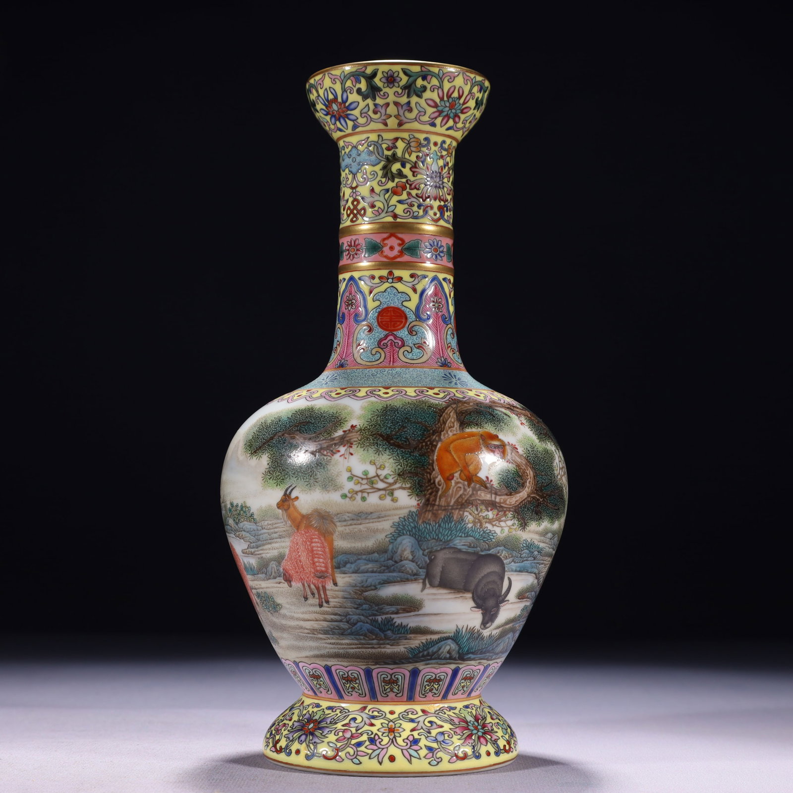 An Exquisite Enamel Painted Gold Animal Pattern Vase: An Exquisite Enamel Painted Gold Animal Pattern Vase,Qing Dynasty,China,Qianlong Six-character Mark,Size:4.3inx9.8in,Weight:600g 珐琅彩描金动物纹瓶