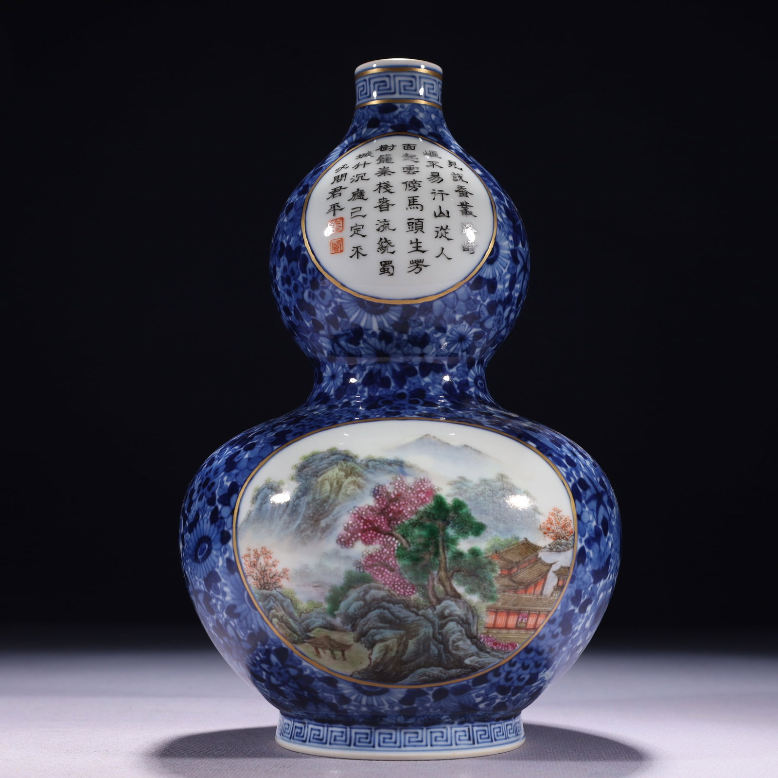 An Exquisite Blue and White Famille-Rose Painted Gold Landscape Pattern Gourd-Shaped Vase,with poem: An Exquisite Blue and White Famille-Rose Painted Gold Landscape Pattern Gourd-Shaped Vase,with poem,Qing Dynasty,China,Qianlong Six-character Mark,Size:5.1inx9.3in,Weight:850g 青花粉