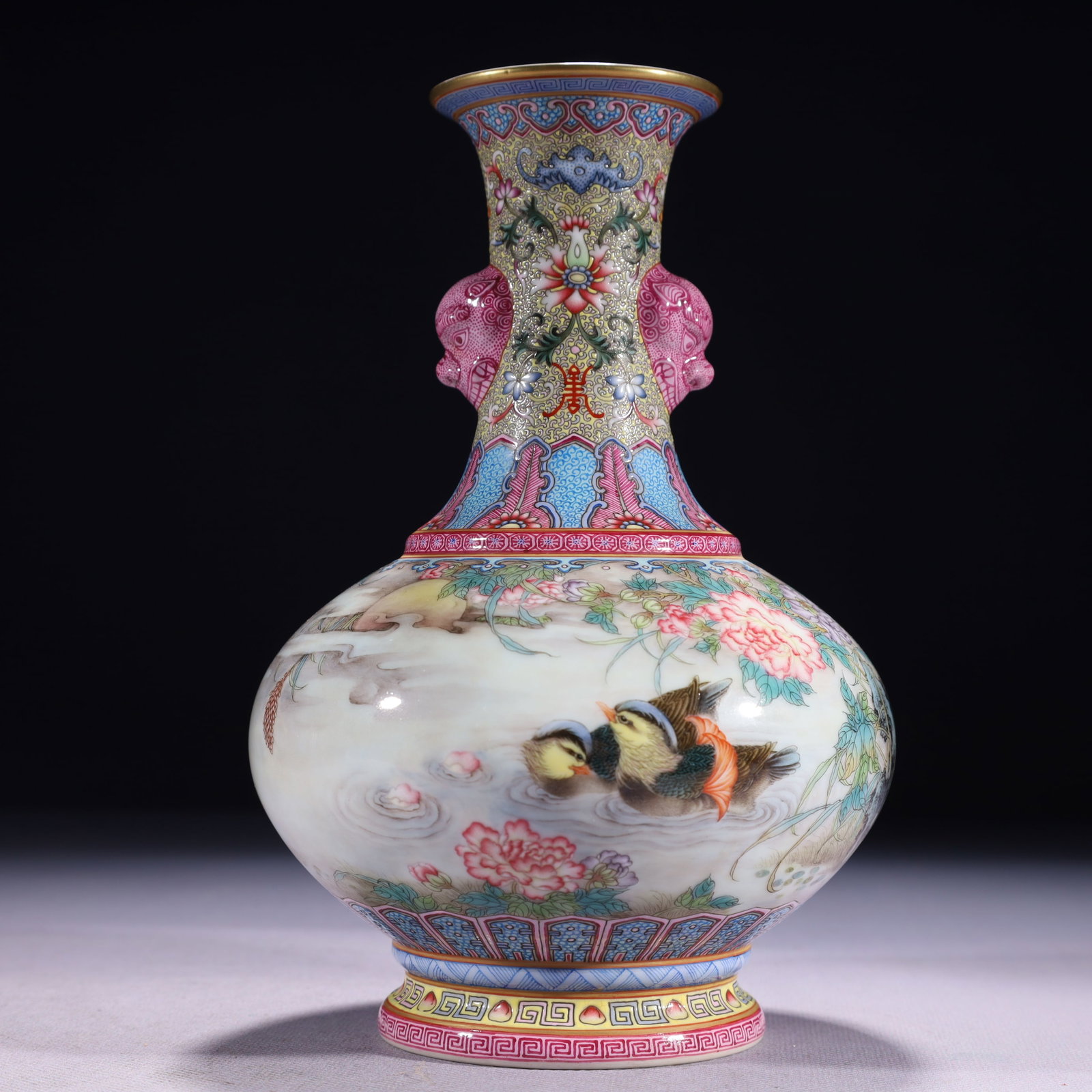 An Exquisite Famille-Rose Painted Gold Flower and Mandarin Duck Pattern Beast-Ears Vase: An Exquisite Famille-Rose Painted Gold Flower and Mandarin Duck Pattern Beast-Ears Vase,Qing Dynasty,China,Qianlong Six-character Mark,Size:4.7inx8.3in,Weight:650g 粉彩描金!