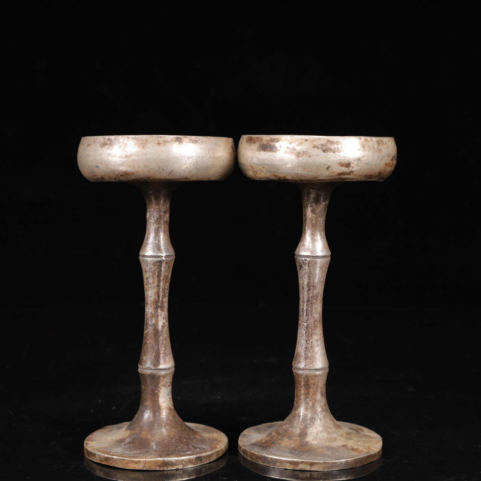 A Pair of Exquisite Silver-Plated Bronze Candlesticks: A Pair of Exquisite Silver-Plated Bronze Candlesticks,Qing Dynasty,China,Size:2.8inx5.5in,Weight:950g 一对铜镀银烛台,中国清代
