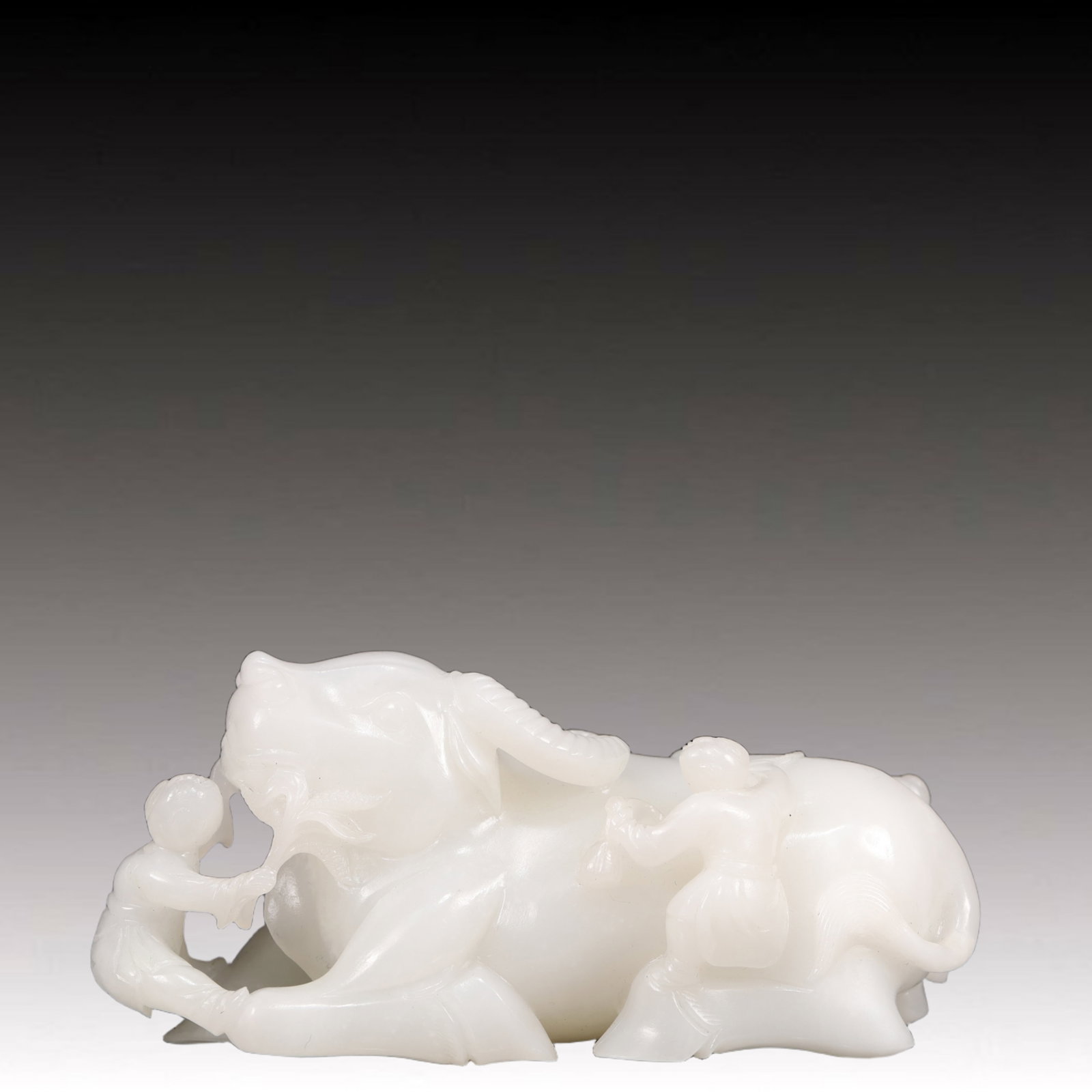 An Exquisite White Jade Buffalo Ornament: An Exquisite White Jade Buffalo Ornament,Qing Dynasty, China,Size:5.1inx2inx2.2in,Weight:400g 白玉牛摆件,中国清代