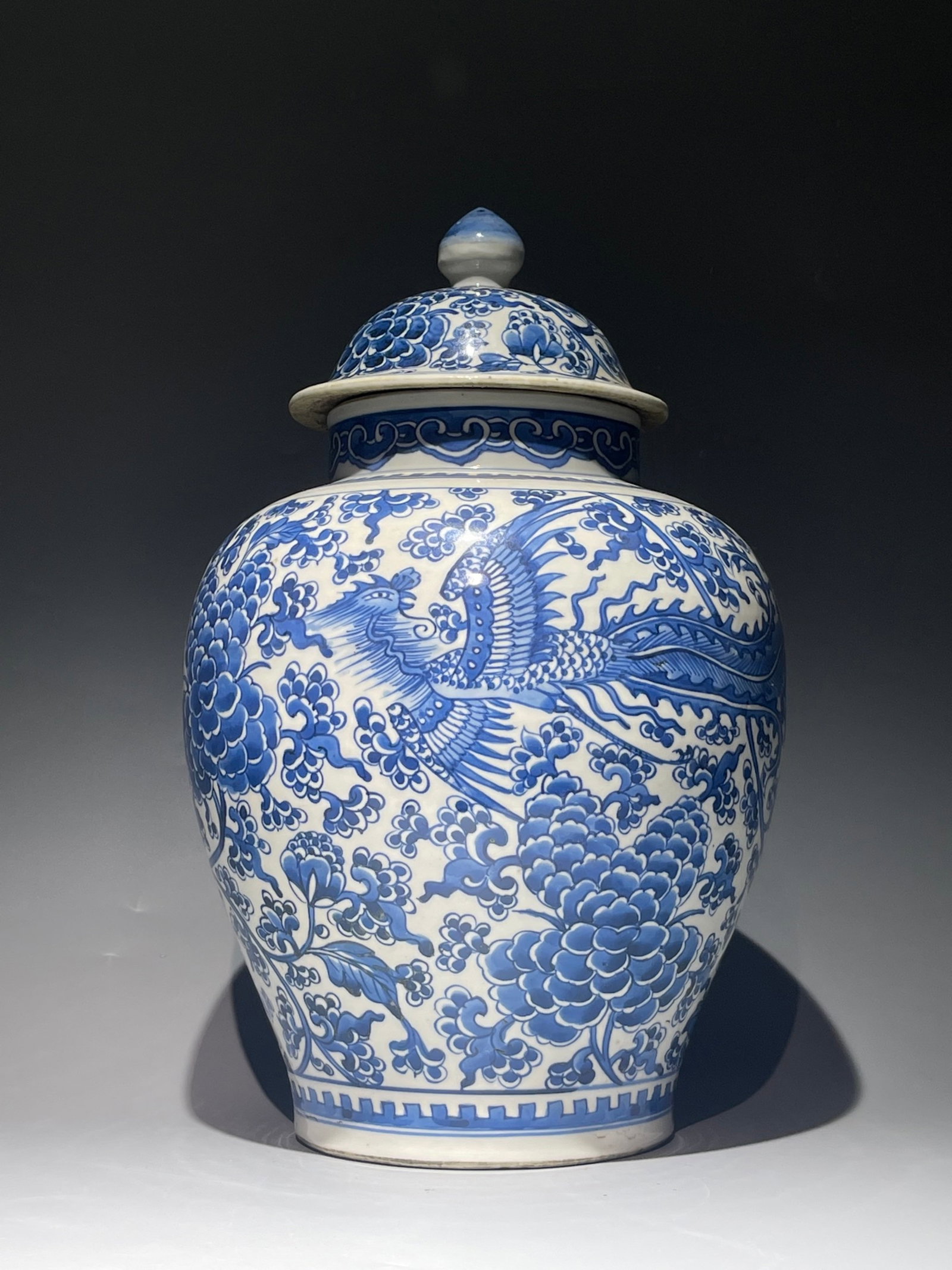 A Rare Blue and White Flower and Phoenix Pattern Jar with Cover: A Rare Blue and White Flower and Phoenix Pattern Jar with Cover,Qing Dynasty,China,Size:15.2inx9.8in 青花花卉凤纹盖罐,中国清代