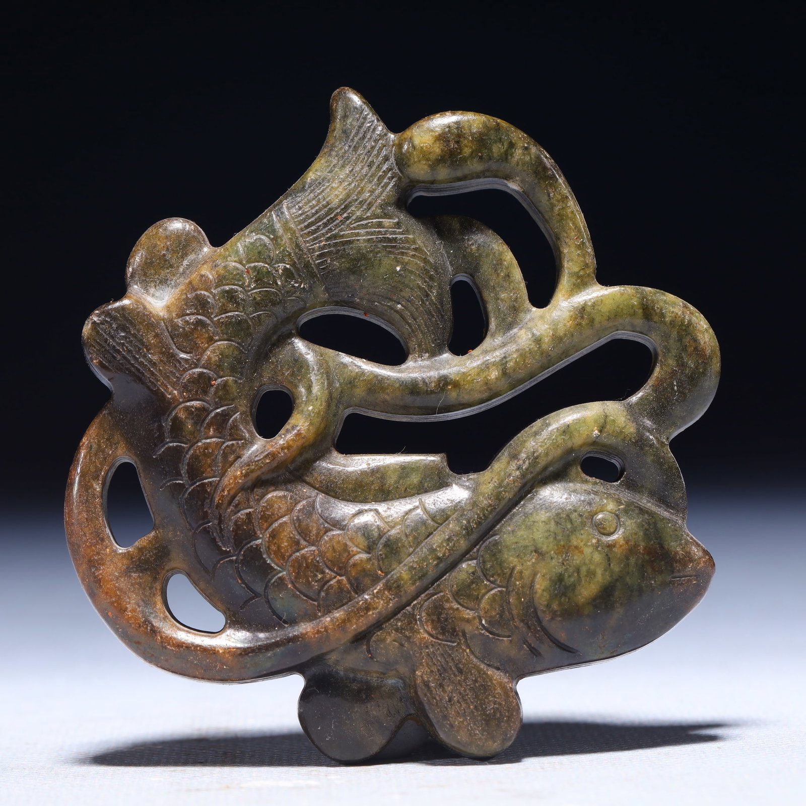An Exquisite Archaic Jade Fish Pendant: An Exquisite Archaic Jade Fish Pendant,Ancient Time,China,Size:3inx0.4inx3in,Weight:91g 高古玉鱼挂件,中国远古时期