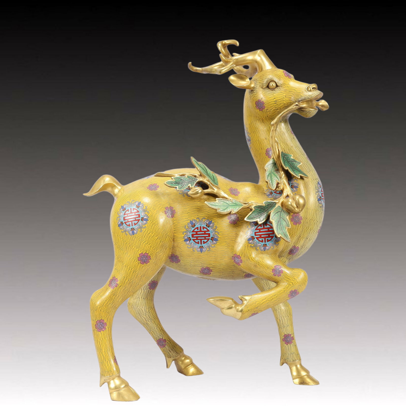 A Huge Cloisonne Flower Pattern Deer Ornament: A Huge Cloisonne Flower Pattern Deer Ornament,Qing Dynasty, China,Qianlong Four-character Mark,Size:12.6inx7.9inx22.4in,Weight:11200g 景泰蓝花卉纹鹿摆&#