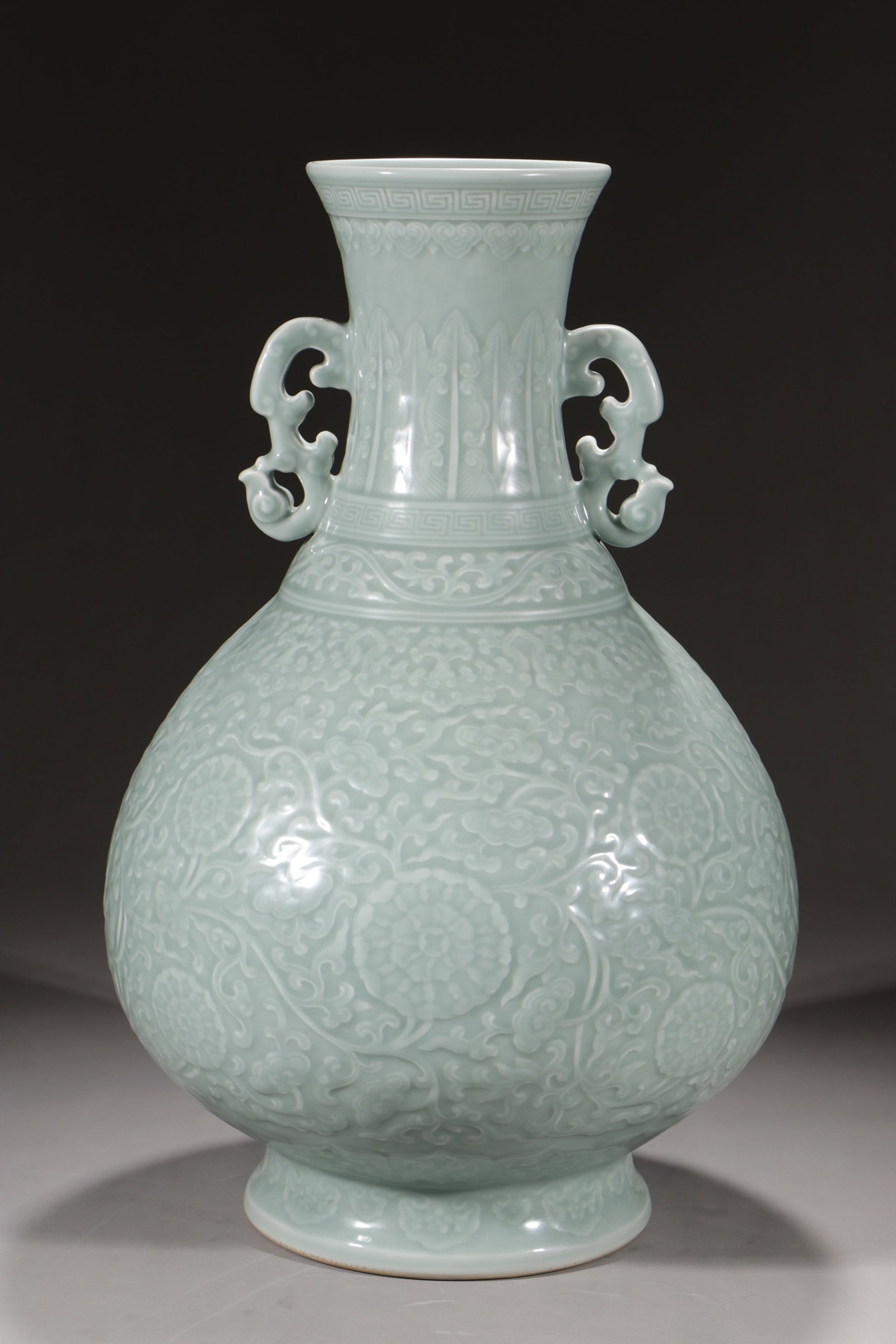 A Huge Celadon Glazed Lotus Pattern Double-Ears Vase: A Huge Celadon Glazed Lotus Pattern Double-Ears Vase,Qing Dynasty,China,Qianlong Six-character Mark,Size:21.5in 粉青釉缠枝莲纹双耳瓶,中