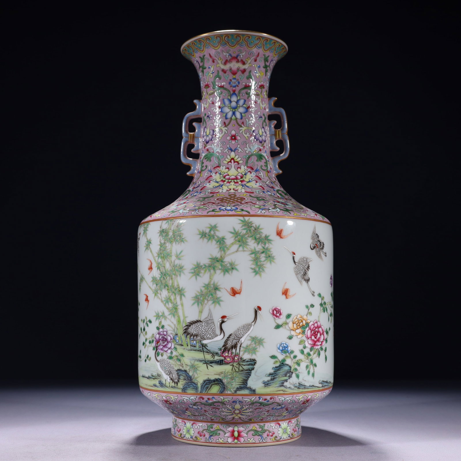 An Exquisite Pink Ground Famille-Rose Painted Gold Flower and Crane Pattern Double-Ears Vase,with: An Exquisite Pink Ground Famille-Rose Painted Gold Flower and Crane Pattern Double-Ears Vase,with poem,Qing Dynasty,China,Qianlong Six-character Mark,Size:5.9inx13.4in,Weight:2000g 粉地