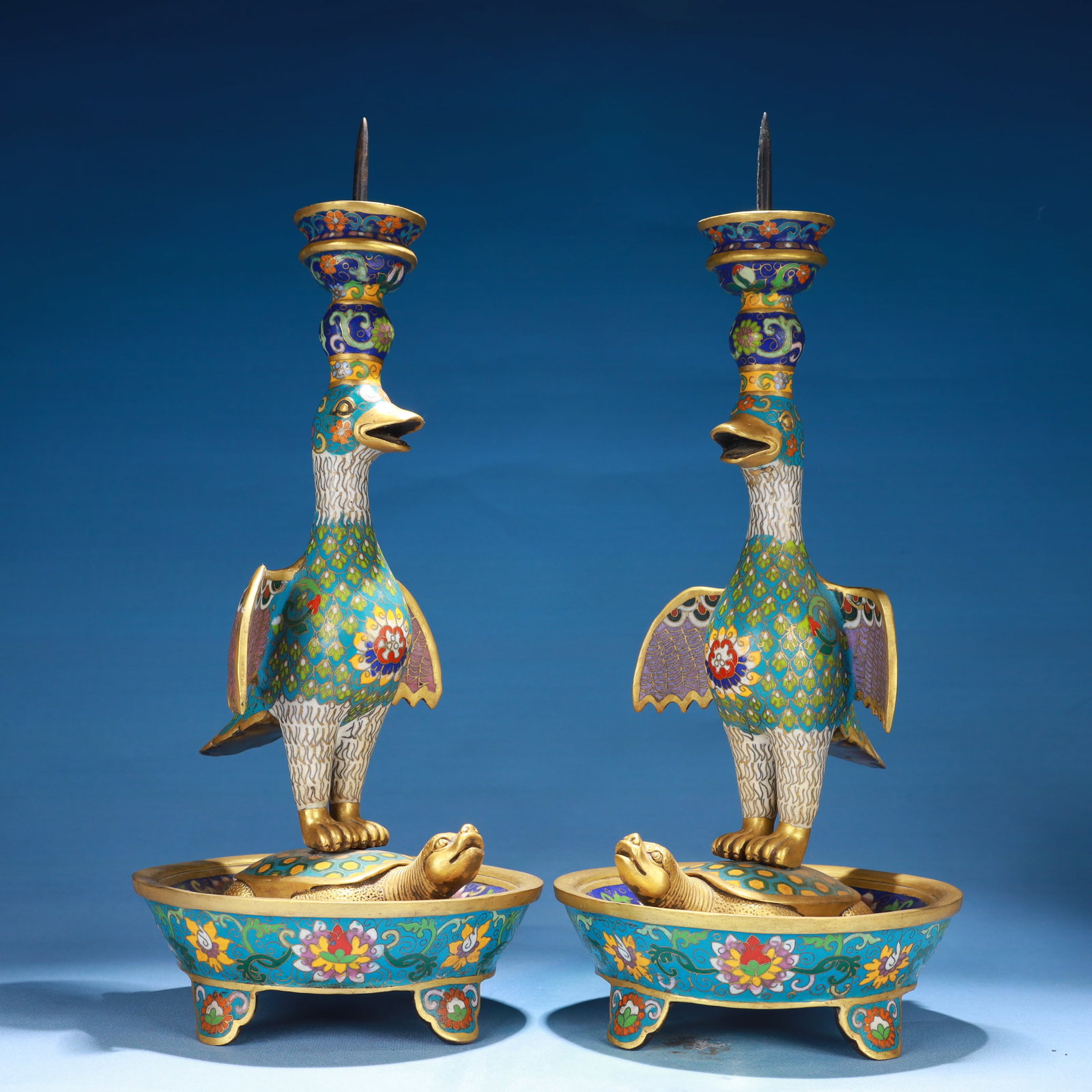 A Pair of Exquisite Cloisonne Flower Pattern Bird Candlesticks: A Pair of Exquisite Cloisonne Flower Pattern Bird Candlesticks,Qing Dynasty,China,Qianlong Six-character Mark,Size:5.9inx14.2in,Weight:6350g