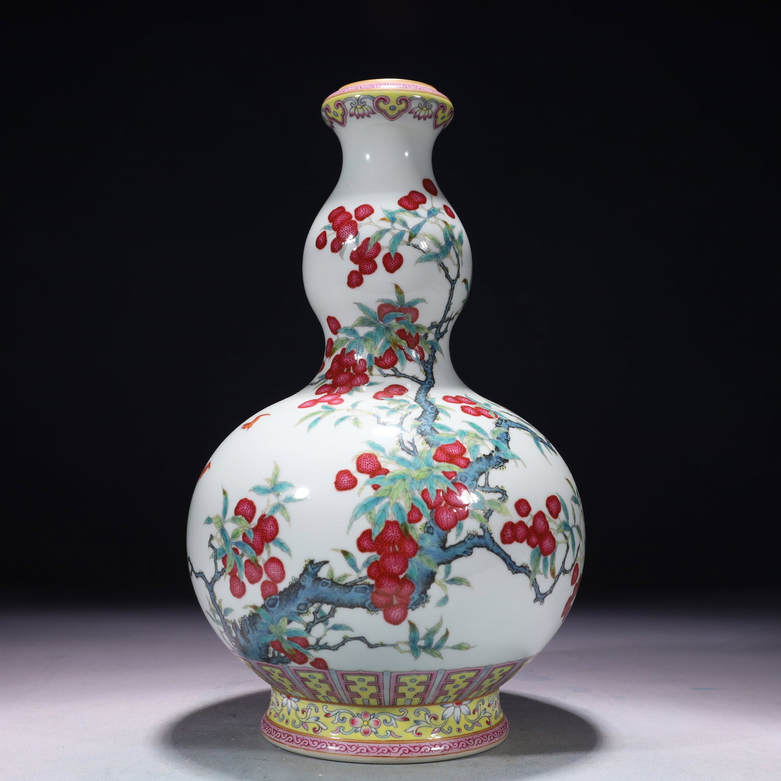 An Exquisite Famille-Rose Painted Gold Litchi Pattern Gourd-Shaped Vase,with poem: An Exquisite Famille-Rose Painted Gold Litchi Pattern Gourd-Shaped Vase,with poem,Qing Dynasty,China,Qianlong Six-character Mark,Size:7.1inx12.2in,Weight:2050g 粉彩描金荔