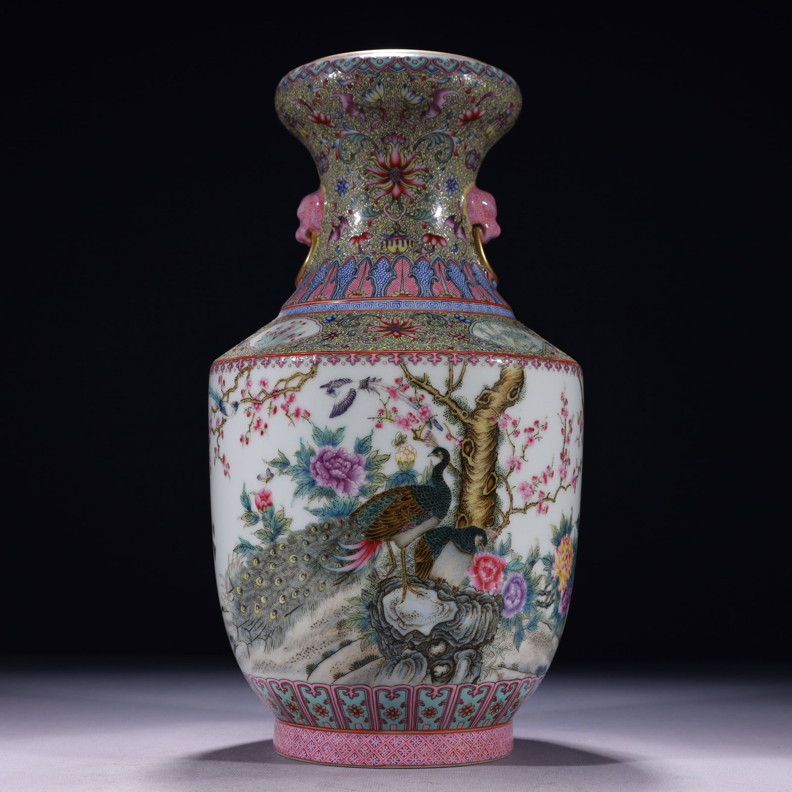 An Exquisite Famille-Rose Painted Gold Flower and Peacock Pattern Beast-Ears Vase,with poem: An Exquisite Famille-Rose Painted Gold Flower and Peacock Pattern Beast-Ears Vase,with poem,Qing Dynasty,China,Qianlong Six-character Mark,Size:6.9inx13.4in,Weight:2700g 粉彩描ດ