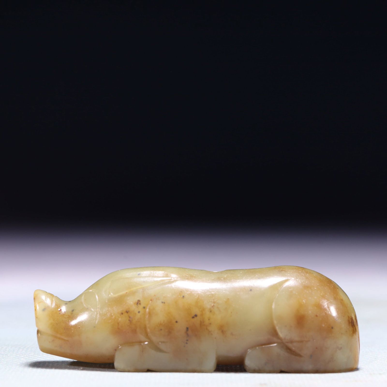 An Exquisite White Jade Wild Pig Ornament: An Exquisite White Jade Wild Pig Ornament,Qing Dynasty,China,Size:3.1inx0.8inx1in,Weight:95.5g 白玉野猪摆件,中国清代