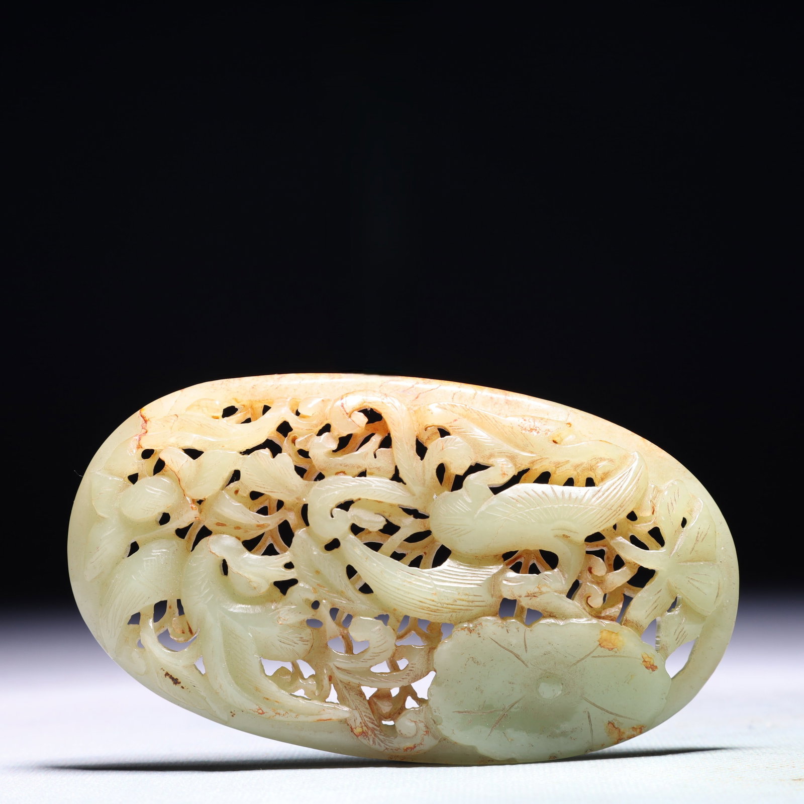 An Exquisite White Jade Flower and Bird Pattern Pendant: An Exquisite White Jade Flower and Bird Pattern Pendant,Qing Dynasty,China,Size:4.5inx2.6in,Weight:146.8g 白玉花鸟纹佩,中国清代