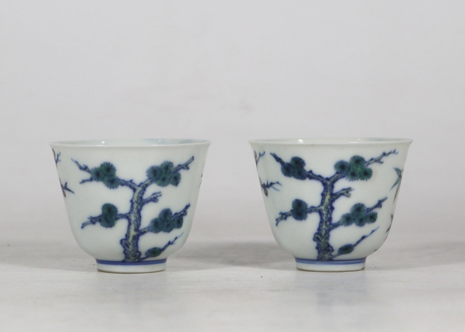 A Pair of Exquisite Doucai Pine,Bamboo and Plum Blossom Pattern Cups (1 of 8)