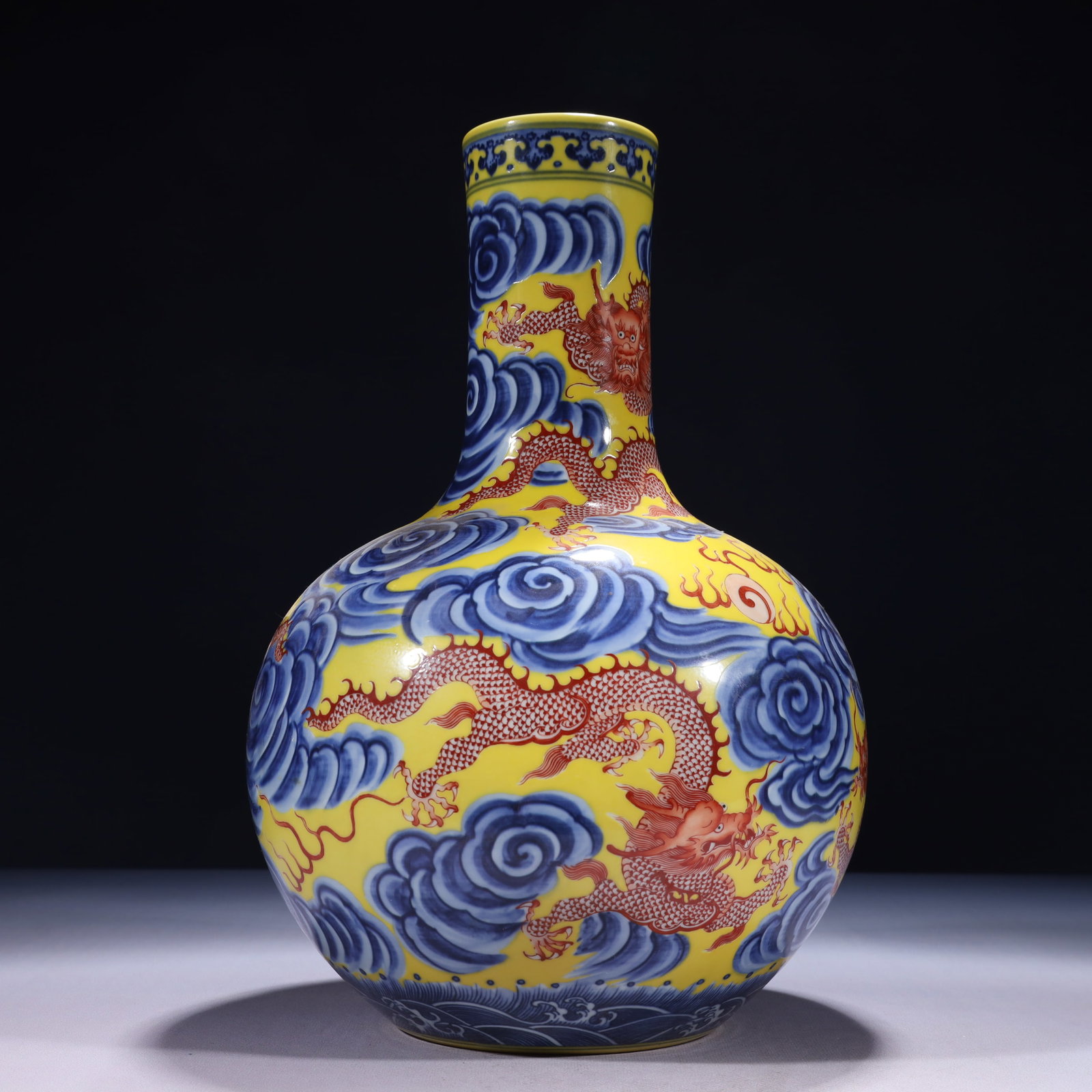 An Exquisite Yellow Ground Blue and White Painted Gold Auspicious Cloud and Dragon Pattern Vase: An Exquisite Yellow Ground Blue and White Painted Gold Auspicious Cloud and Dragon Pattern Vase,Qing Dynasty,China,Qianlong Six-character Mark,Size:8.3inx13.8in,Weight:3200g 黄地青&#