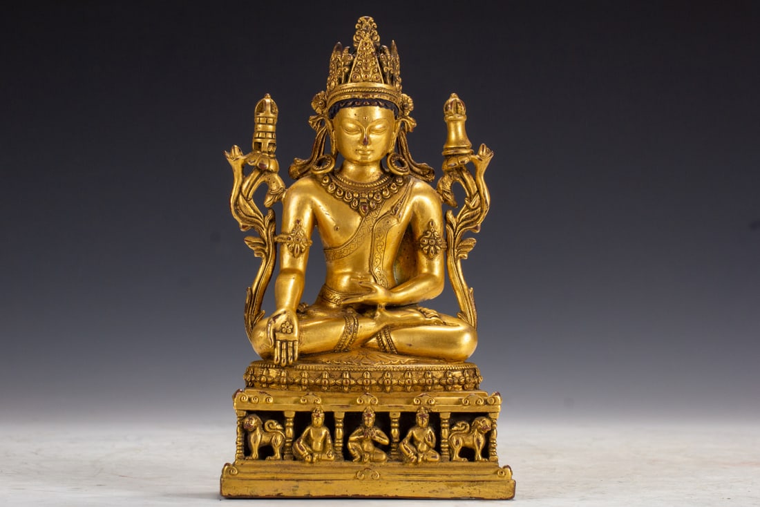 A Solemn Gilt Bronze Statue of Sakyamuni: A Solemn Gilt Bronze Statue of Sakyamuni,Qing Dynasty,China,Size:4.9inx3.7inx8.5in,Weight:1630g 铜鎏金释迦摩尼像,中国清代