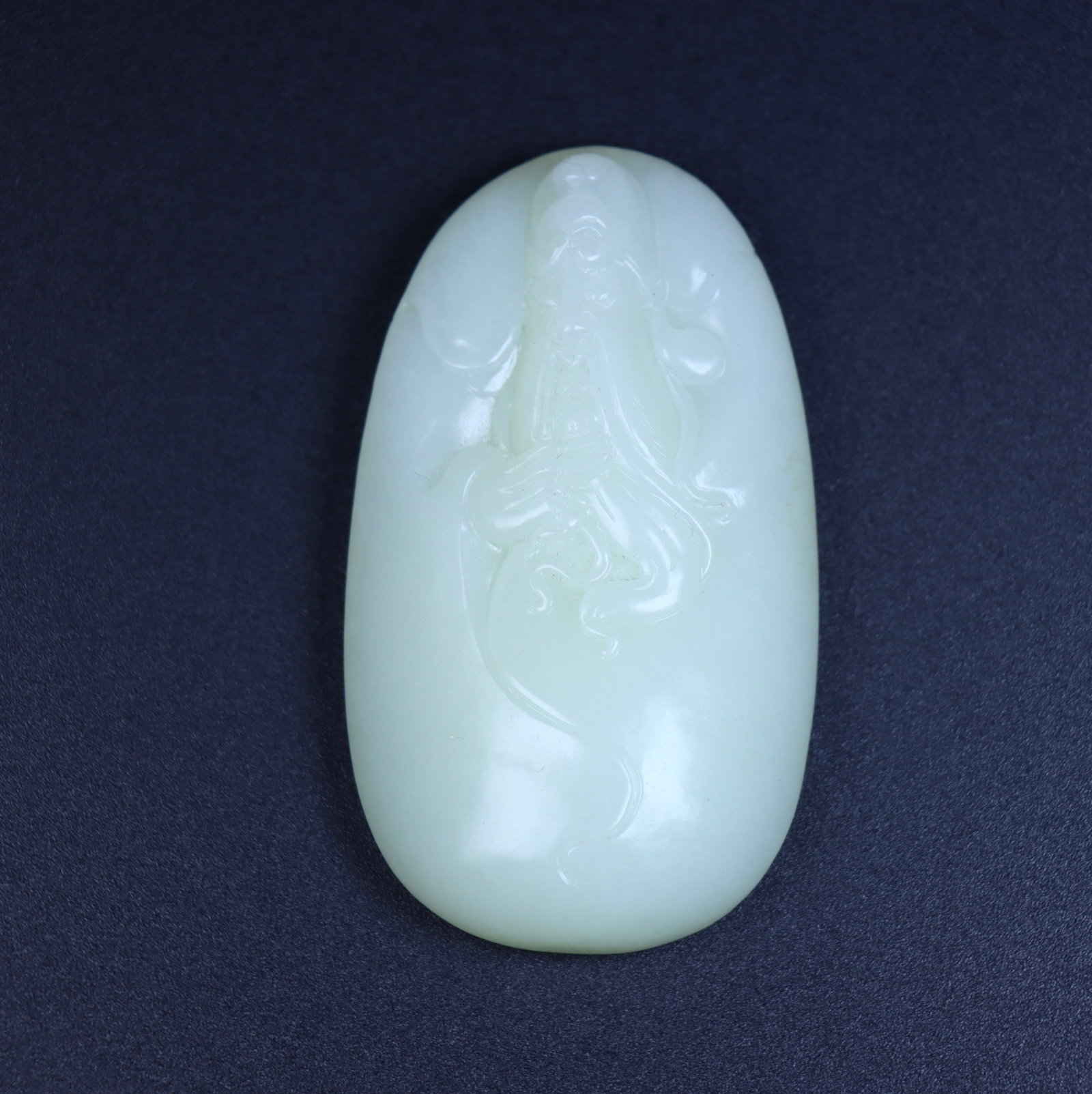 An Exquisite White Jade Figure Pattern Pendant: An Exquisite White Jade Figure Pattern Pendant,Qing Dynasty,China,Size:2.8inx1.7inx0.6in,Weight:74g 白玉人物纹挂件,中国清代