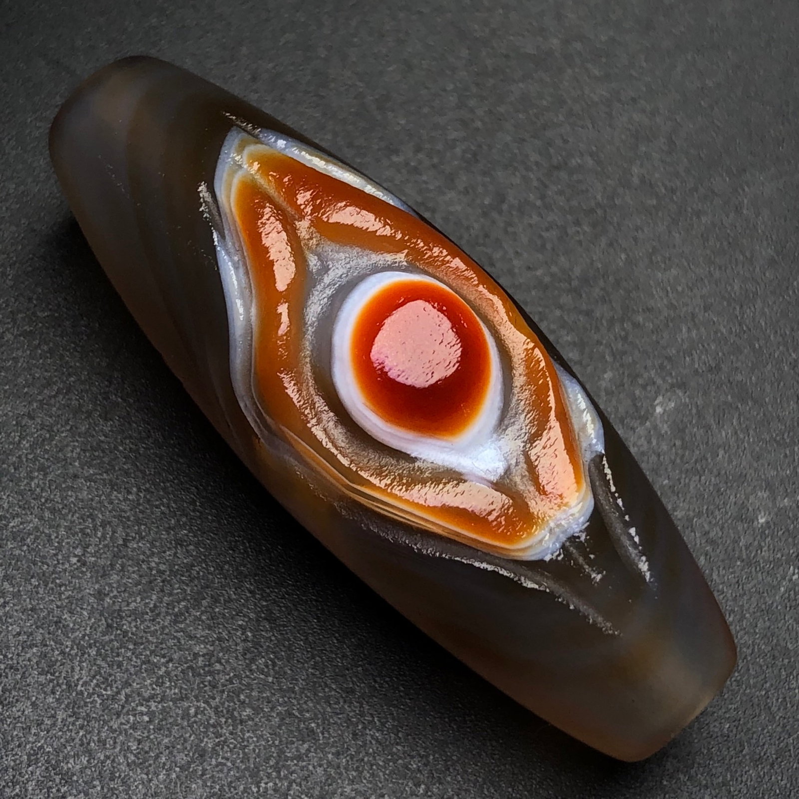An Exquisite Dzi Bead Pendant: An Exquisite Dzi Bead Pendant,Size:2inx0.7in,Weight:22.1g 天珠挂件