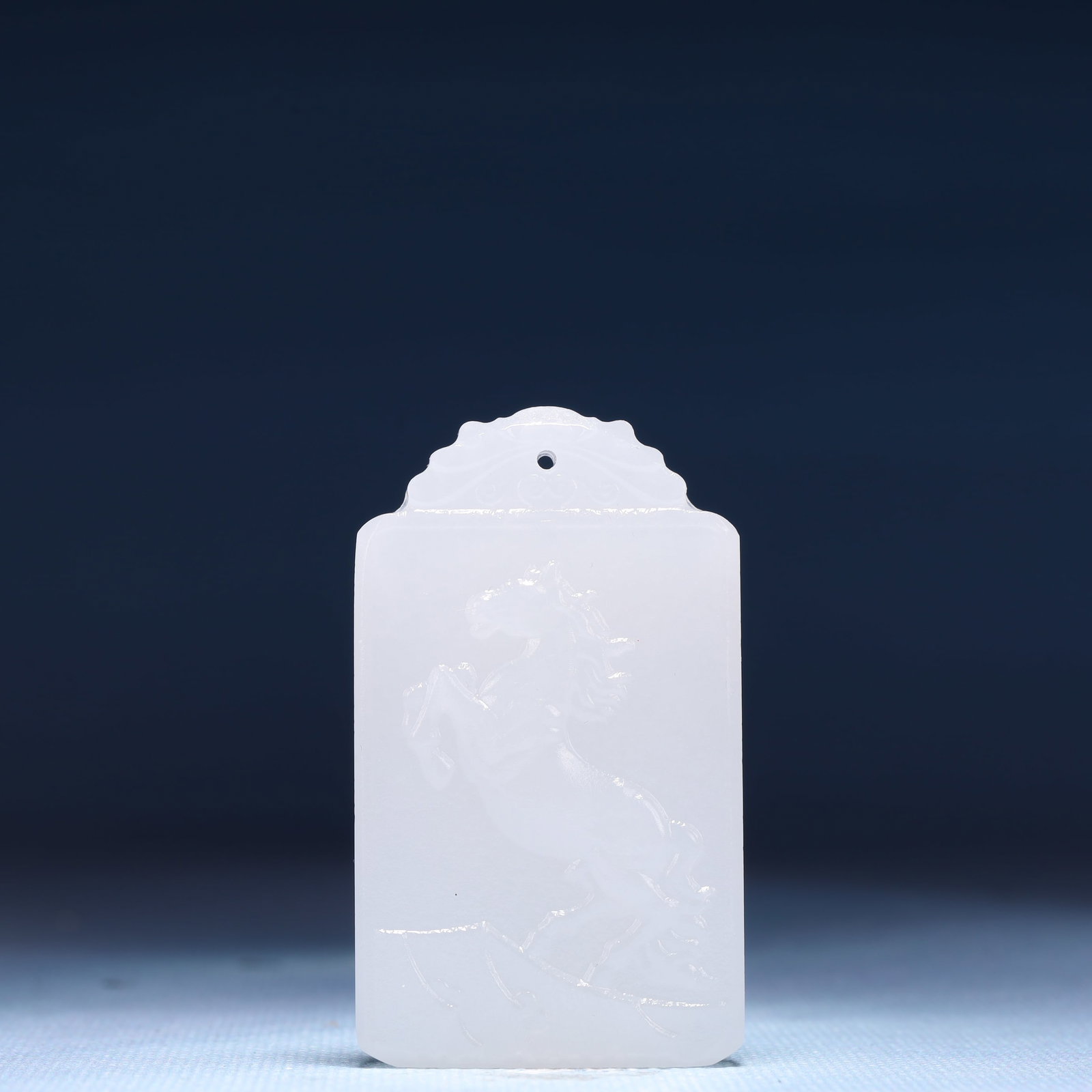 An Exquisite White Jade Horse Pattern Pendant: An Exquisite White Jade Horse Pattern Pendant,Size:1.6inx0.4inx2.4in,Weight:49g 白玉骏马纹牌