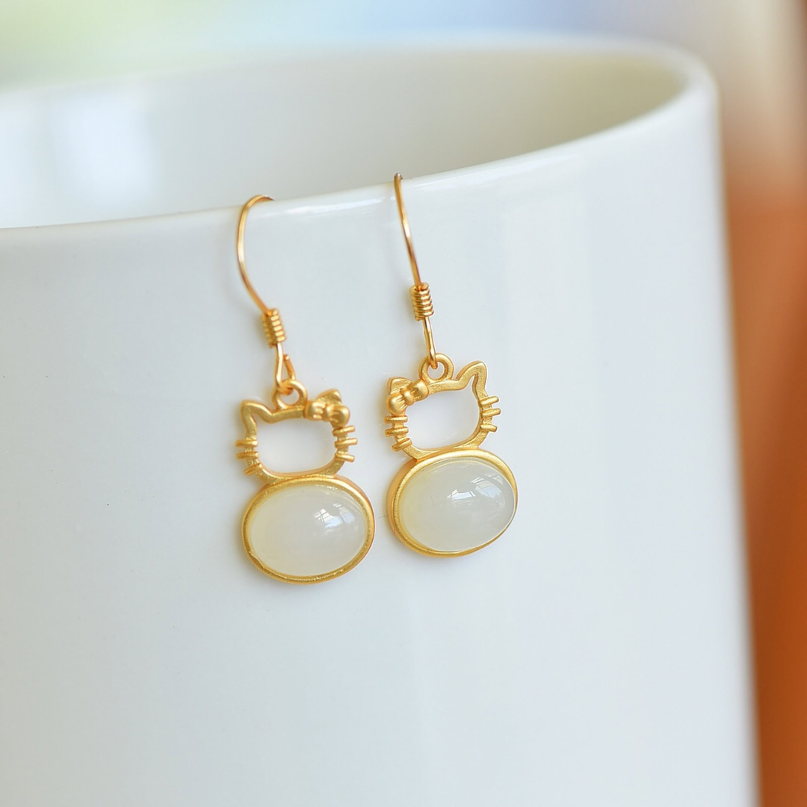 A Pair of Exquisite Sterling Silver-Gold Plated Inlaid White Jade Earrings: A Pair of Exquisite Sterling Silver-Gold Plated Inlaid White Jade Earrings , Size :0.3inx0.4in
