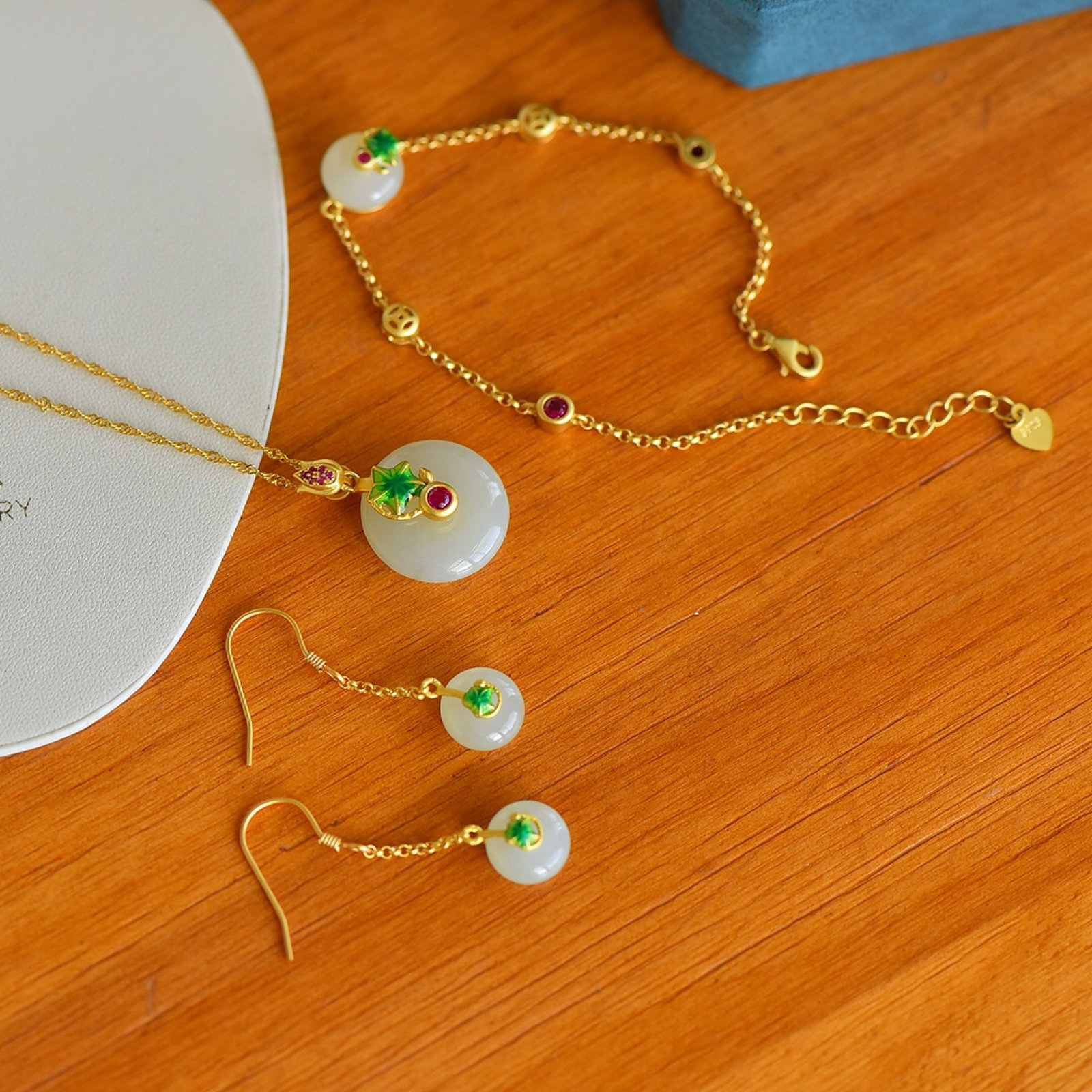 A Set of Fine Sterling Silver-Gold Plated Inlaid White Jade Jewelries: A Set of Exquisite Sterling Silver-Gold Plated Inlaid White Jade Jewelry , Size :0.7inx0.7in,0.4inx0.4in,0.4inx0.4in 一套纯银镀金镶白玉首
