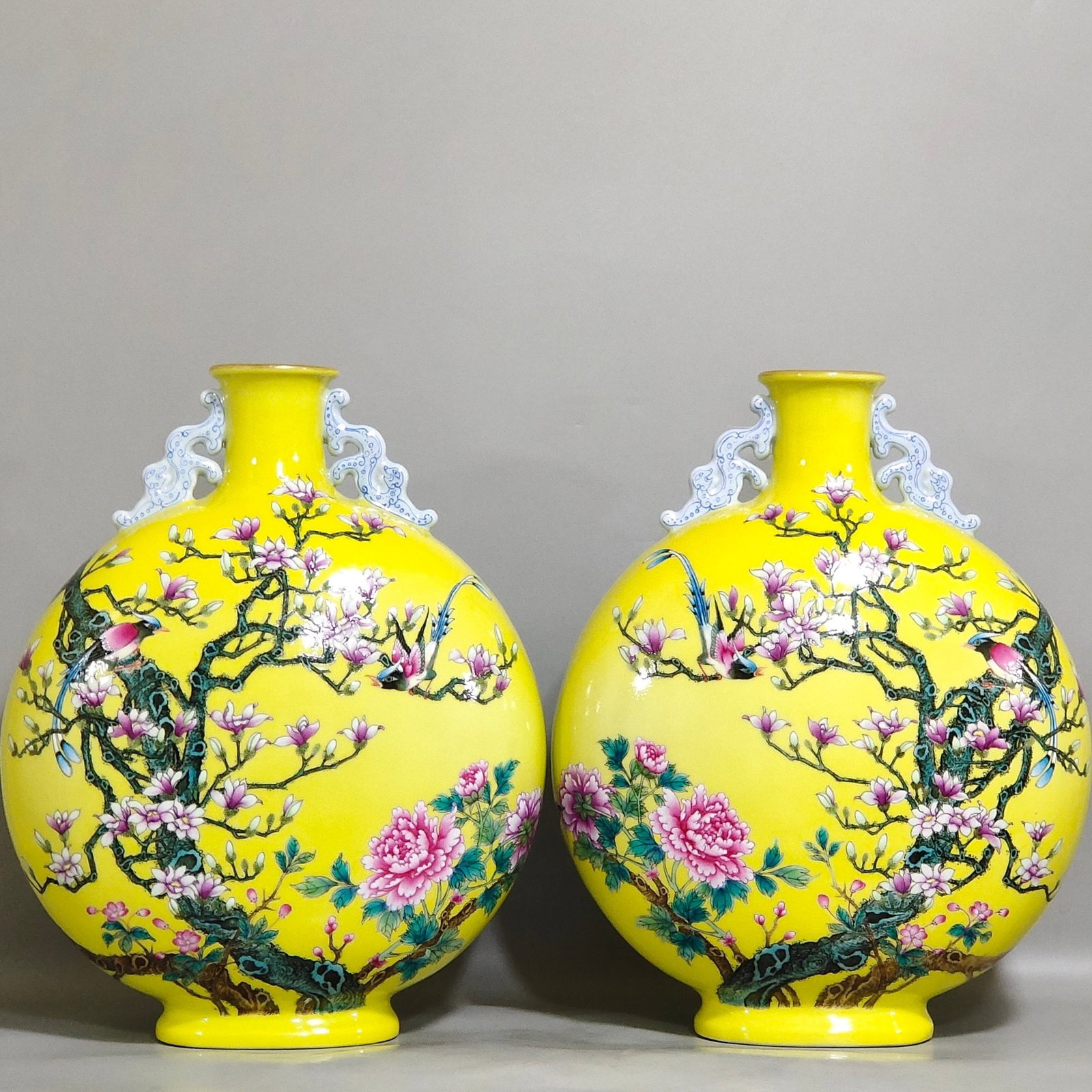 A Pair of Rare Famille-Rose Yellow Glazed Flower and Bird Pattern Dragon-Ears Vases: A Pair of Rare Famille-Rose Yellow Glazed Flower and Bird Pattern Dragon-Ears Vases,Qing Dynasty,China,Yongzheng Six-character Mark,Size:12.8inx9.8in 一对粉彩黄釉&#
