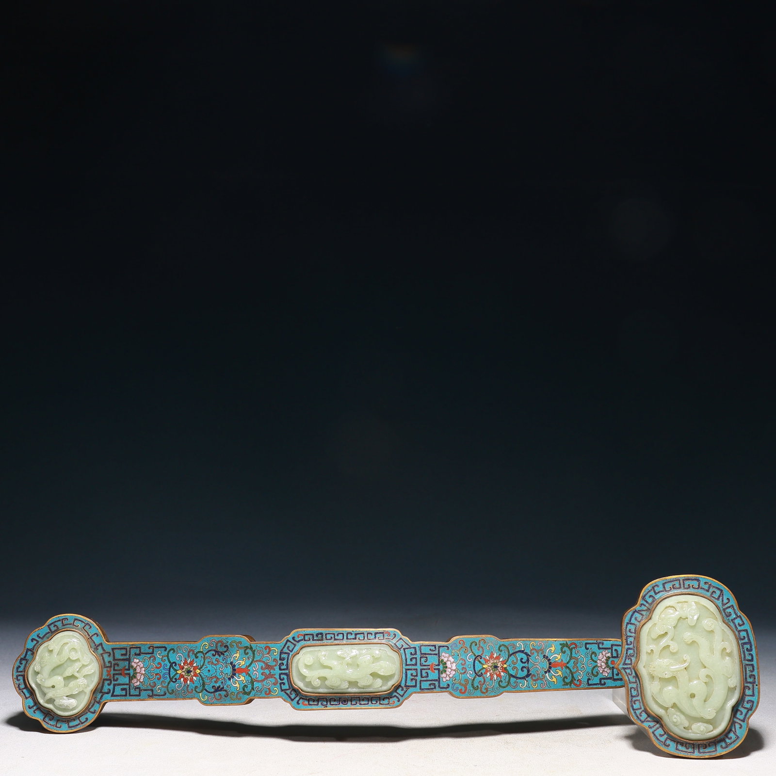 A Huge Cloisonne Inlaid White Jade Lotus,Eight Treasures and Chi-Dragon Pattern Ruyi: A Huge Cloisonne Inlaid White Jade Lotus,Eight Treasures and Chi-Dragon Pattern Ruyi,Qing Dynasty,China,Qianlong Four-character Mark,Size:18.1inx4.1inx2.8in,Weight:1100g