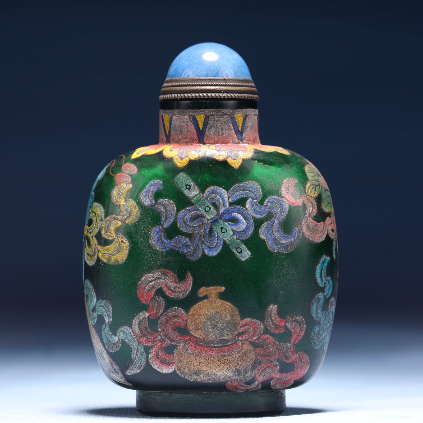 An Exquisite Glass Eight Treasures Pattern Snuff Bottle: An Exquisite Glass Eight Treasures Pattern Snuff Bottle,Qing Dynasty,China,Qianlong Four-character Mark,Size:2.4inx1.2inx3.5in,Weight:125g 琉璃八宝纹鼻烟ã