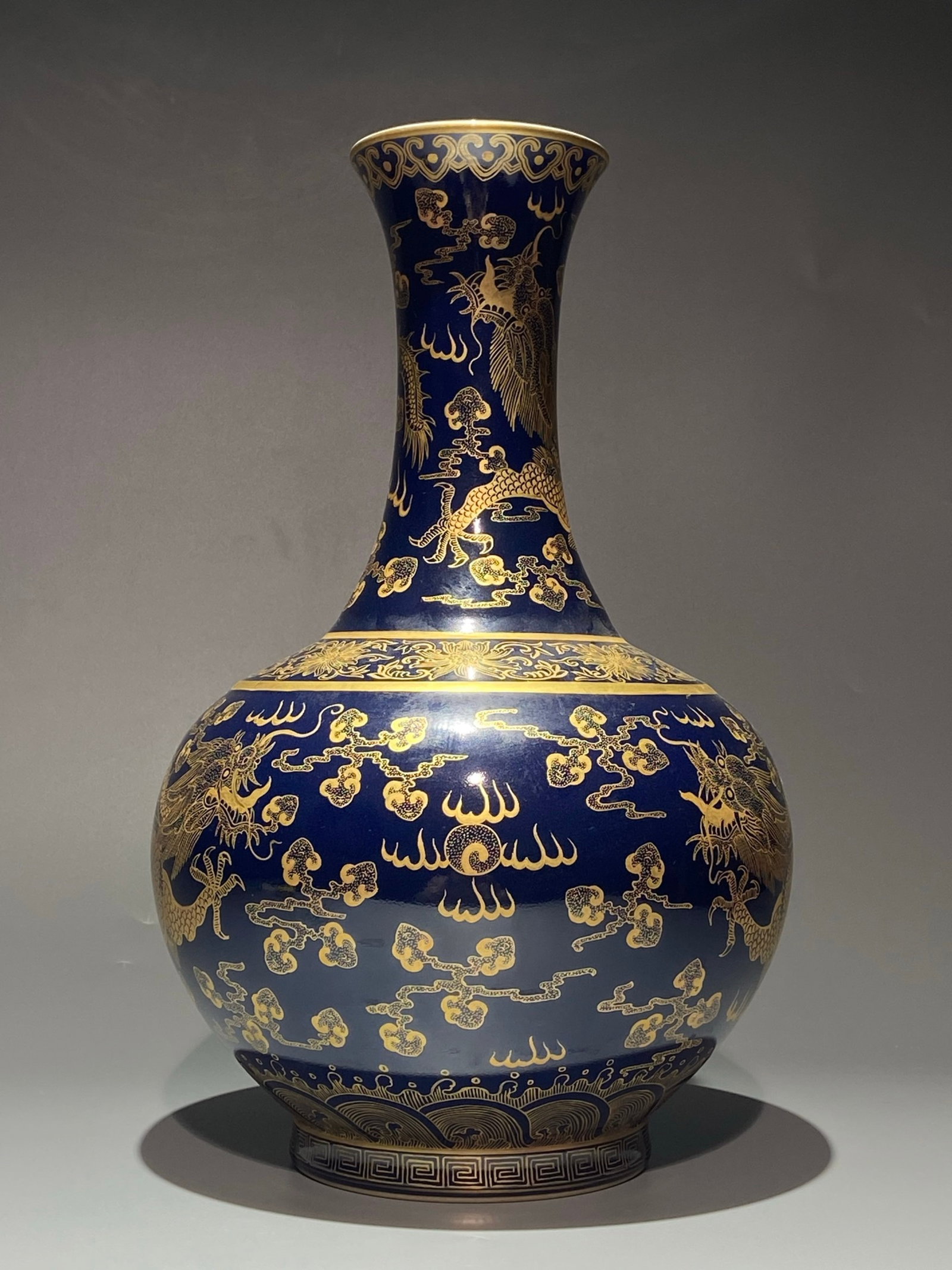 A Rare Ji Blue Glazed Painted Gold Auspicious Cloud and Dragon Pattern Vase: A Rare Ji Blue Glazed Painted Gold Auspicious Cloud and Dragon Pattern Vase,Qing Dynasty,China,Daoguang Six-character Mark,Size:15.7inx9.8in 霁蓝釉描金祥云