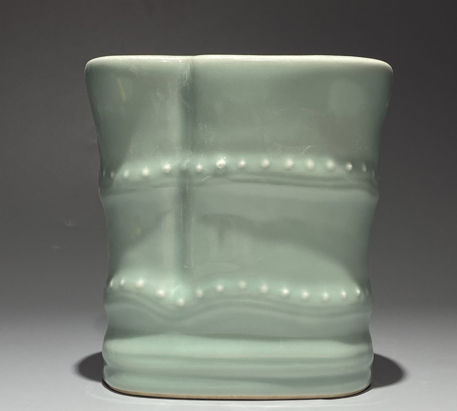 An Exquisite Celadon Glazed Brush Pot: An Exquisite Celadon Glazed Brush Pot,Qing Dynasty,China,Kangxi Four-character Mark,Size:6.1inx5.9in 粉青釉笔筒,中国清代,康熙四&