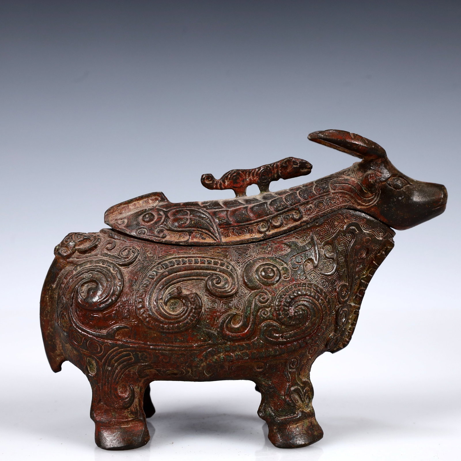 A Rare Bronze Buffalo Cup: A Rare Bronze Buffalo Cup,W.Zhou,China,Size:6.3inx2.8inx4.3in,Weight:550g 青铜牛杯,中国西周时期