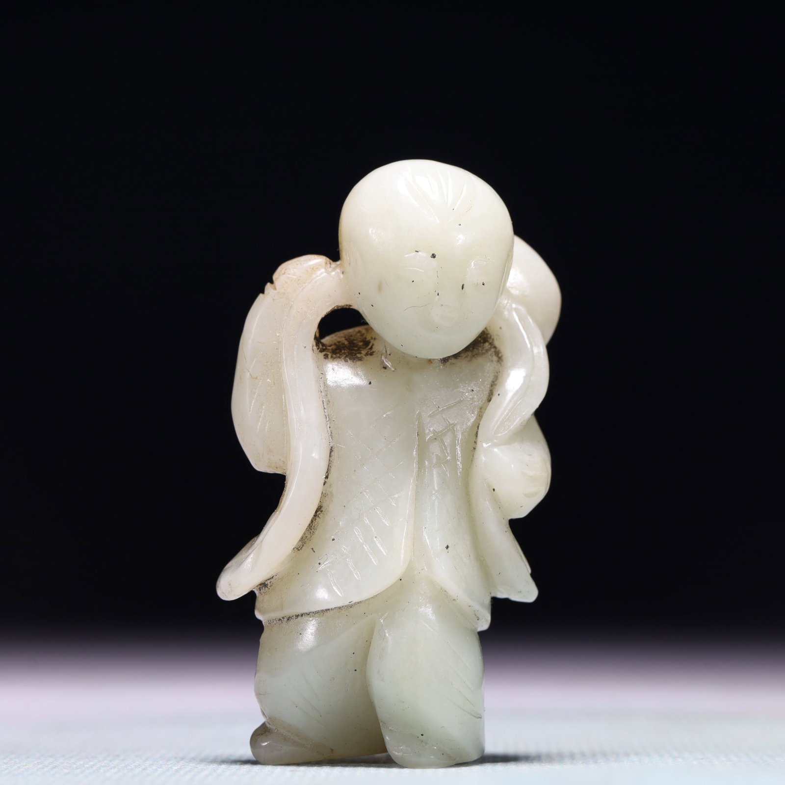 An Exquisite White Jade Figure Ornament: An Exquisite White Jade Figure Ornament,Qing Dynasty,China,Size:1.2inx0.8inx2.2in,Weight:53.1g 白玉人物摆件,中国清代