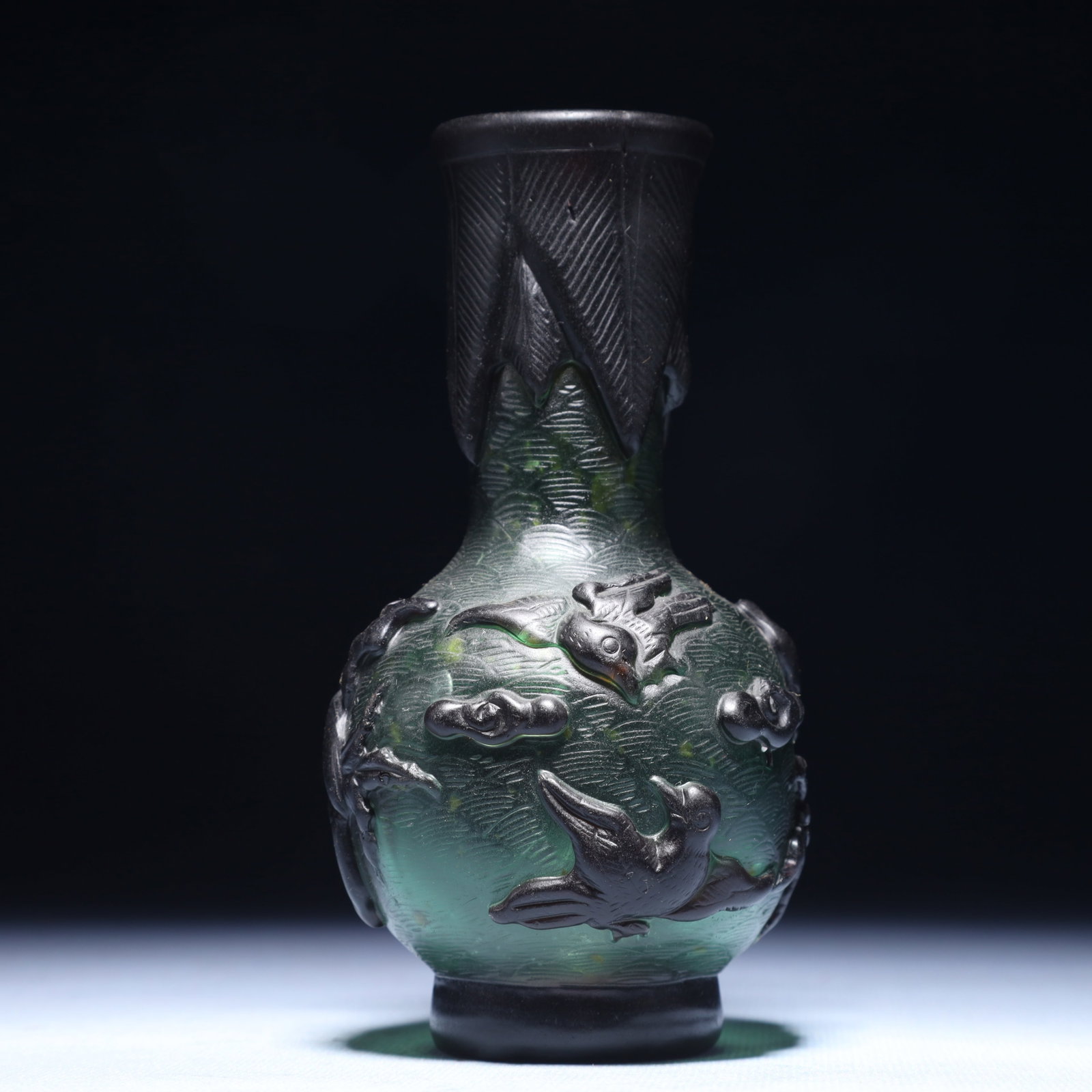 An Exquisite Glass Flower and Bird Pattern Vase: An Exquisite Glass Flower and Bird Pattern Vase,Qing Dynasty,China,Qianlong Four-character Mark,Size:2.8inx5.5in,Weight:250g 琉璃花鸟纹瓶,中国清&#