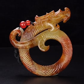 An Exquisite White Jade Dragon-head Pendant