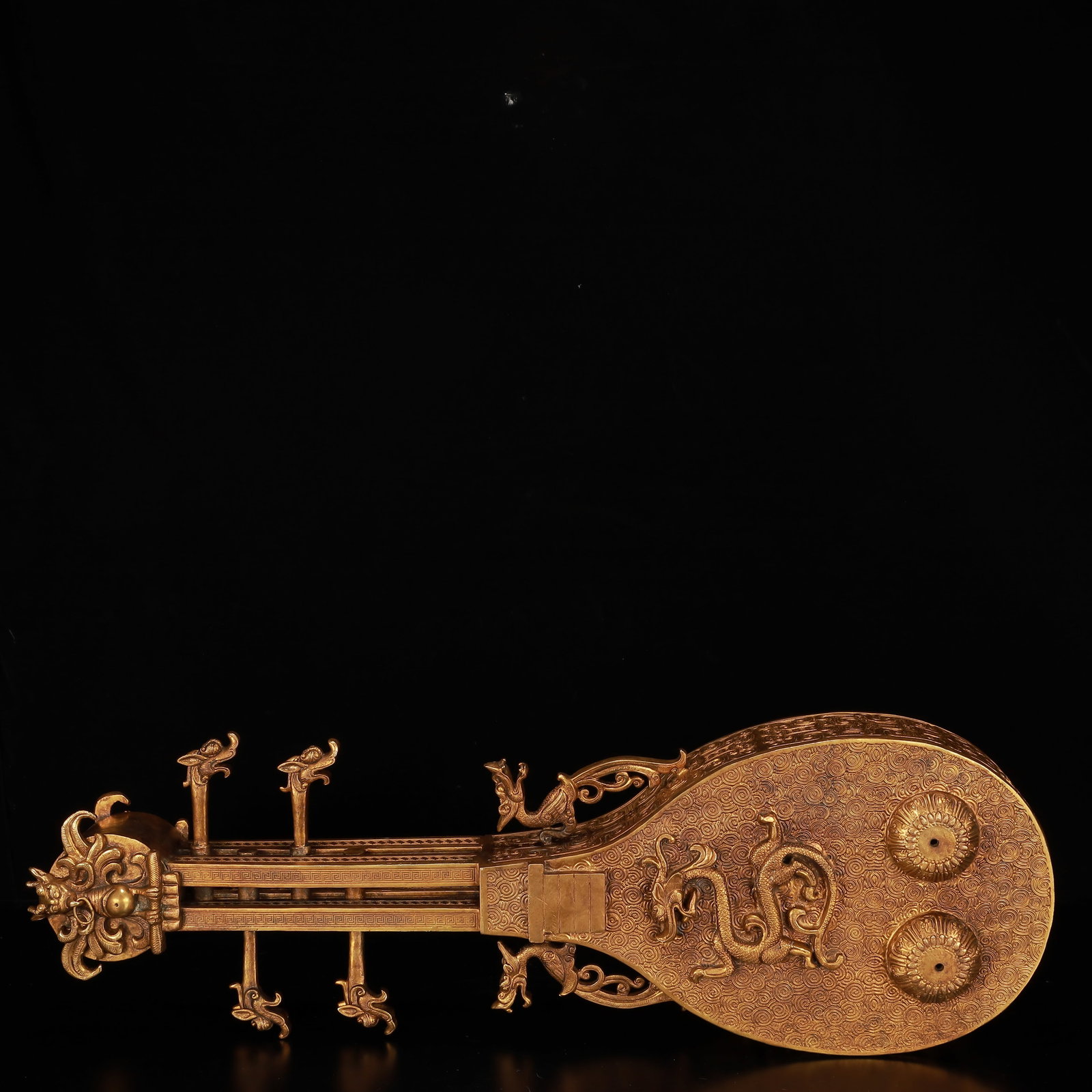 A Rare Gilt Bronze Auspicious Beast Pattern Qin Ornament: A Rare Gilt Bronze Auspicious Beast Pattern Qin Ornament,Qing Dynasty, China,Size:26.4inx8.7inx3.9in,Weight:6900g