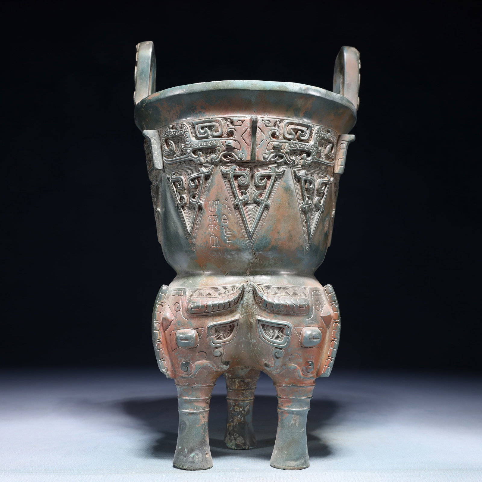 A Rare Bronze Beast-Face Pattern Double-Ears and Tripod Censer,With Inscription: A Rare Bronze Beast-Face Pattern Double-Ears and Tripod Censer,With Inscription,Shang Dynasty,China,Size:6.3inx11.8in,Weight:2100g 青铜兽面纹双耳三Ū