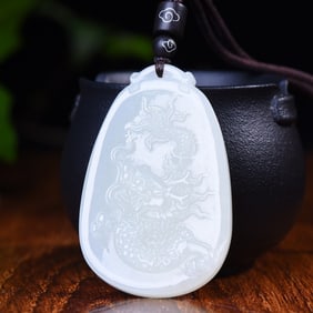 An Exquisite White Jade Dragon Pattern Pendant